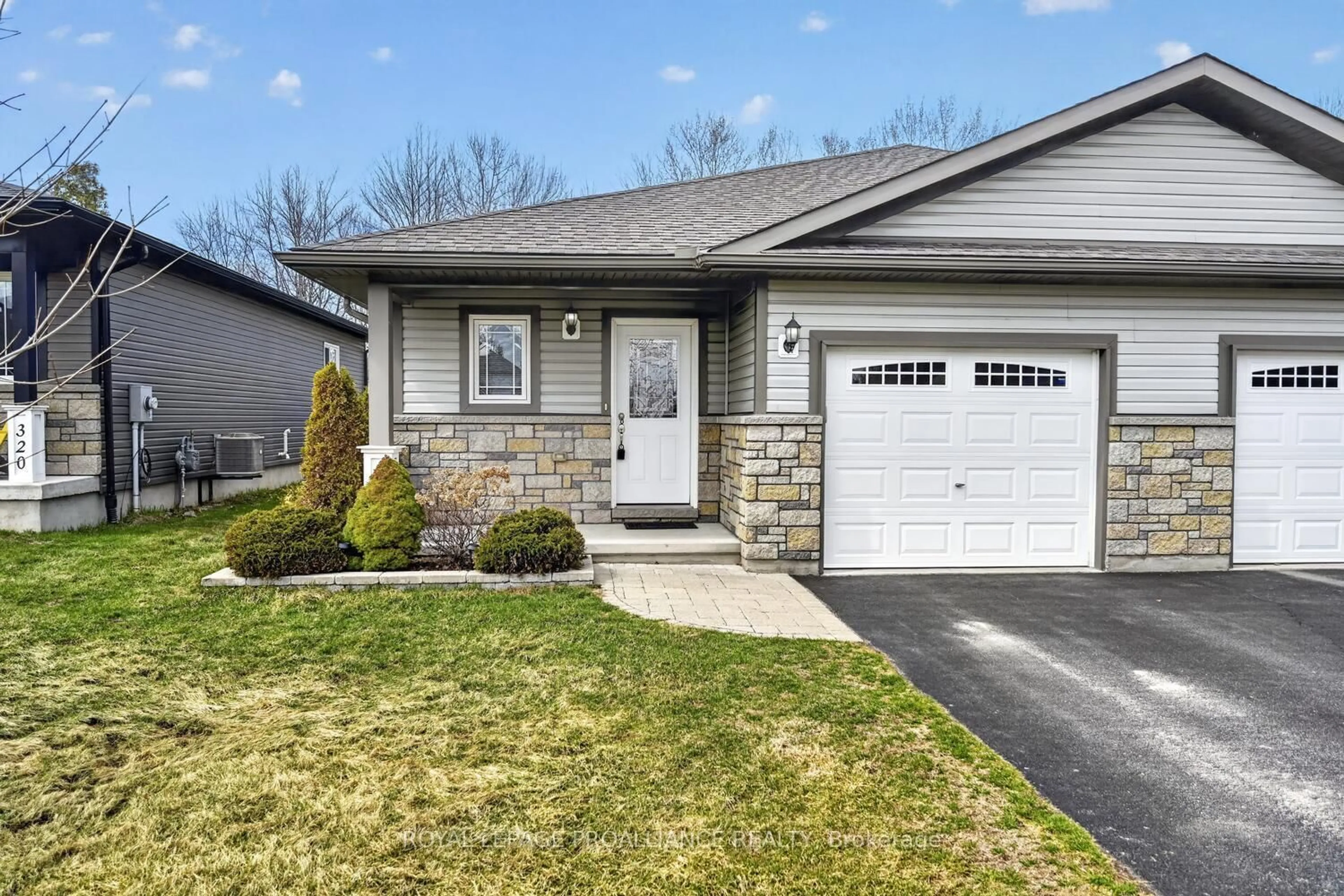 Home with vinyl exterior material, street for 324 Fischl Dr, Prescott Ontario K0E 1T0