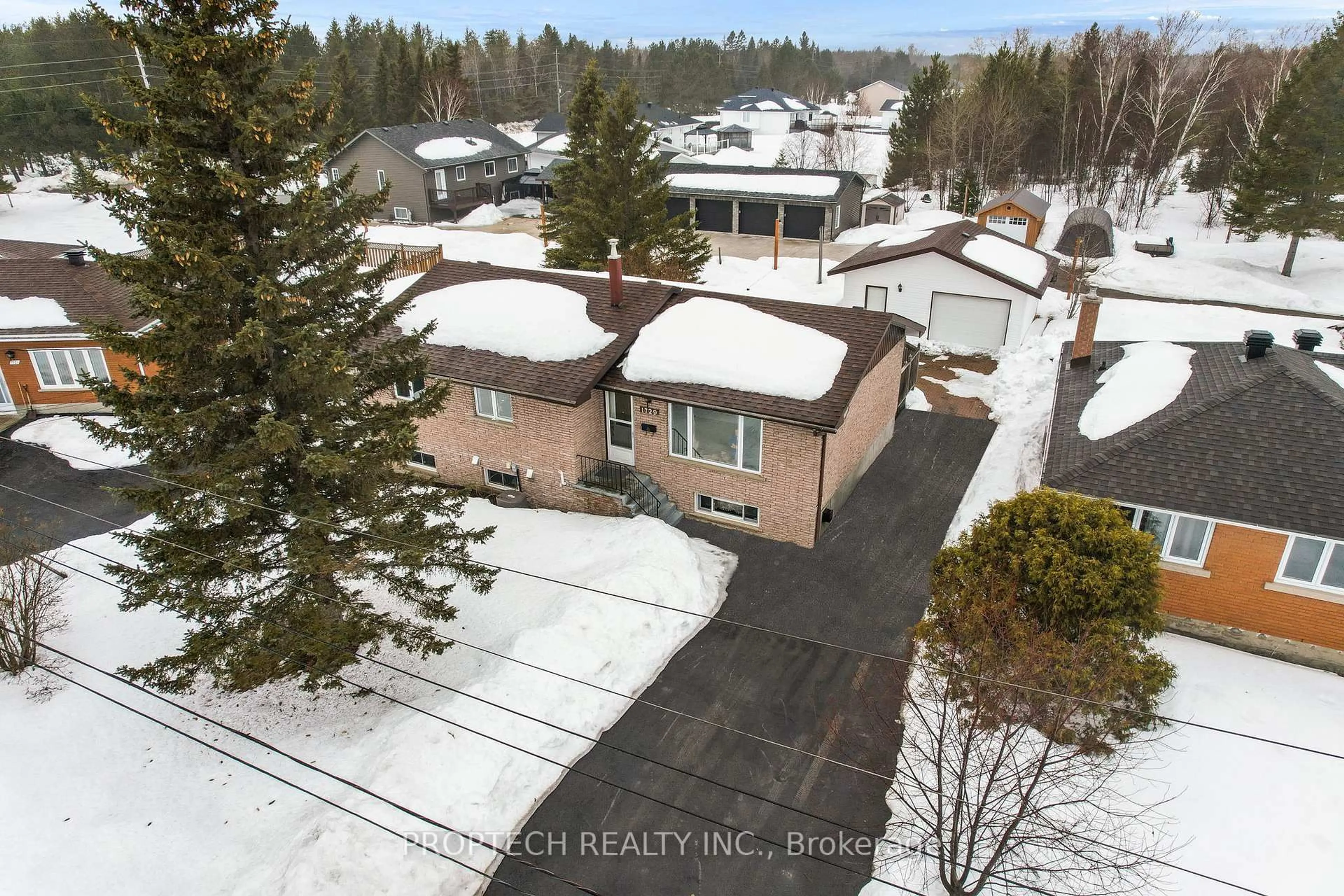 A pic from outside/outdoor area/front of a property/back of a property/a pic from drone, street for 1729 Charles Crt, Greater Sudbury Ontario P3N 1H3