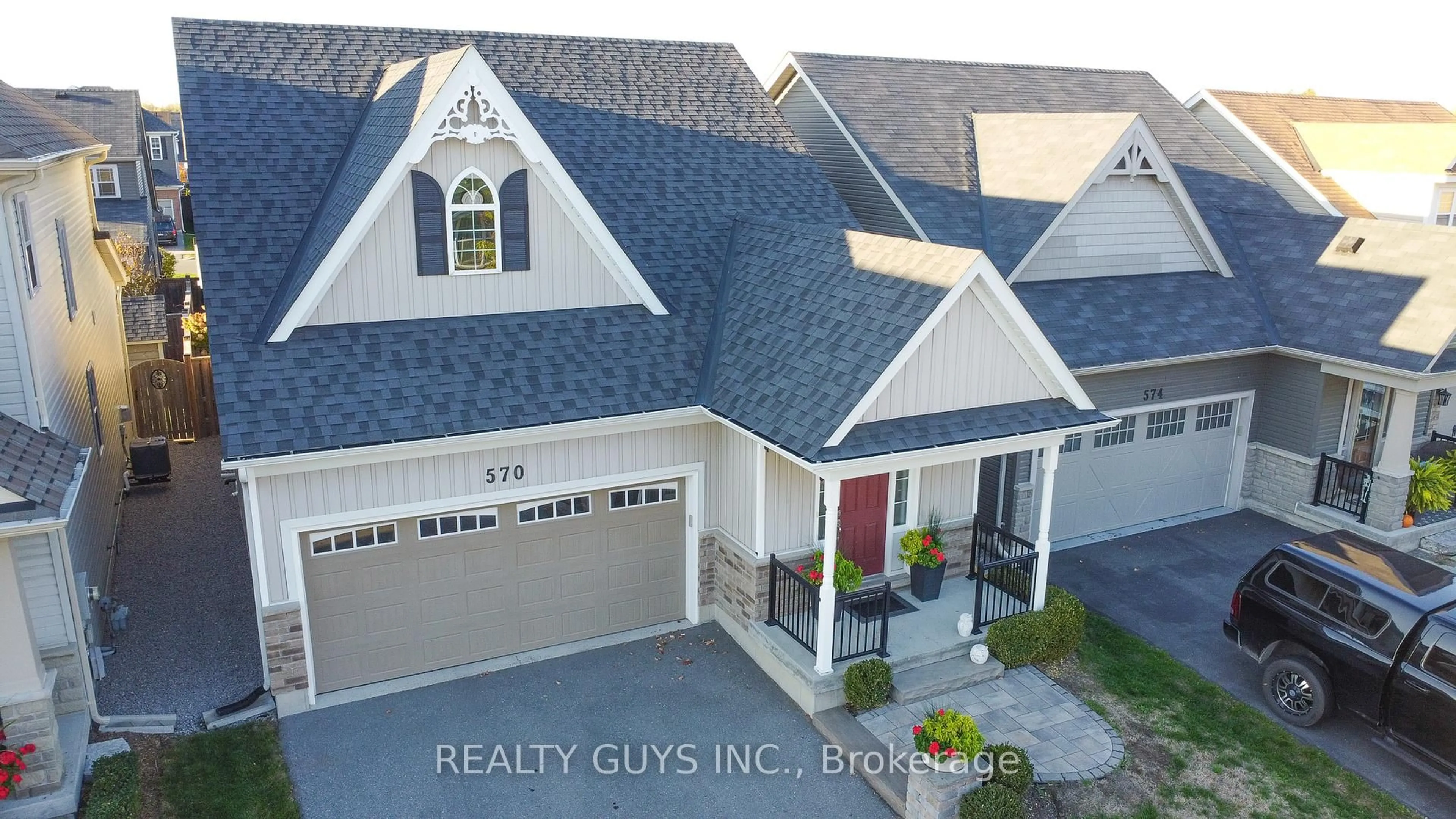 A pic from outside/outdoor area/front of a property/back of a property/a pic from drone, unknown for 570 Grange Way, Peterborough Ontario K9H 0G5