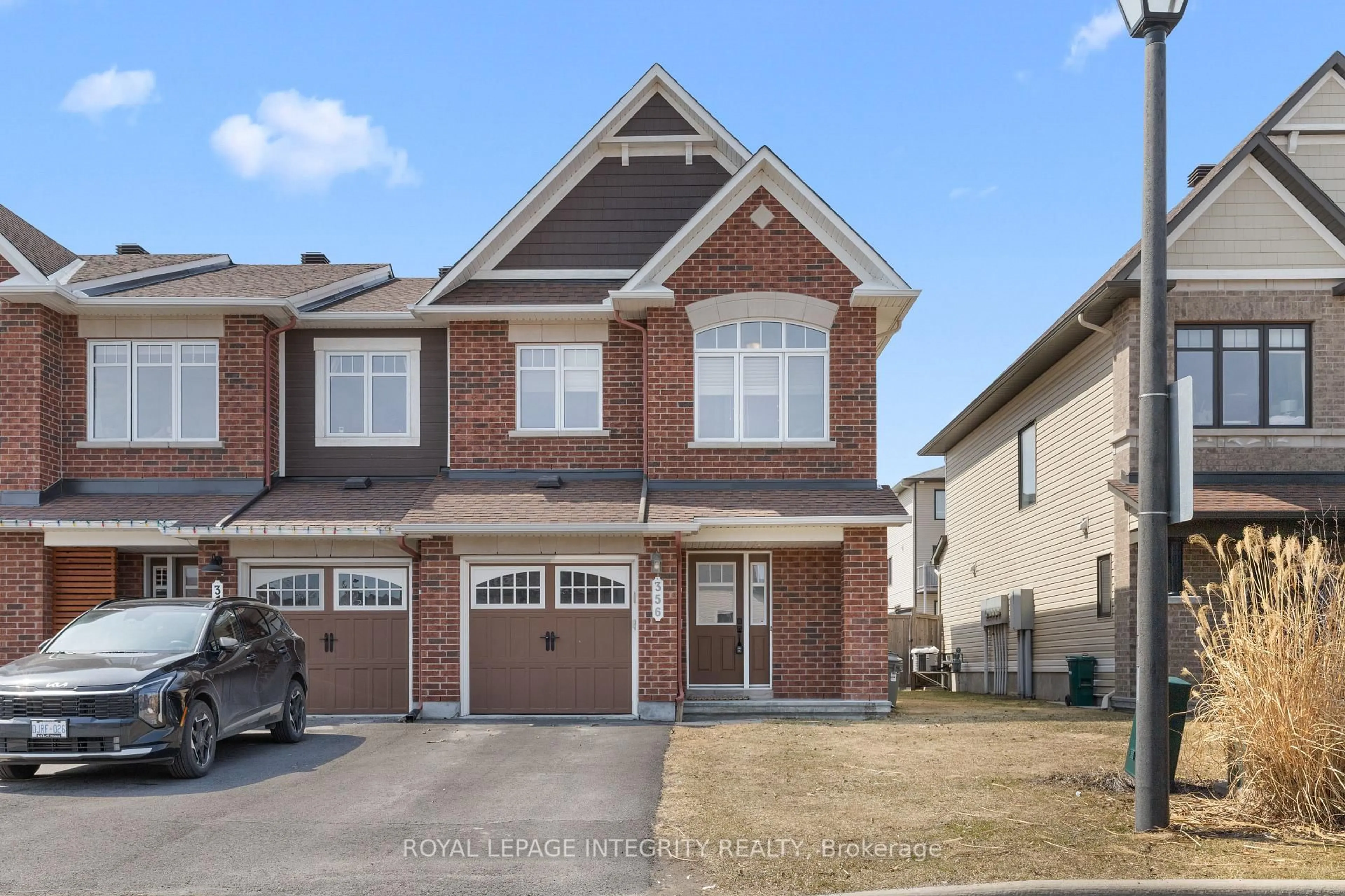 Home with brick exterior material, street for 356 Ravenswood Way, Ottawa Ontario K4A 0R8