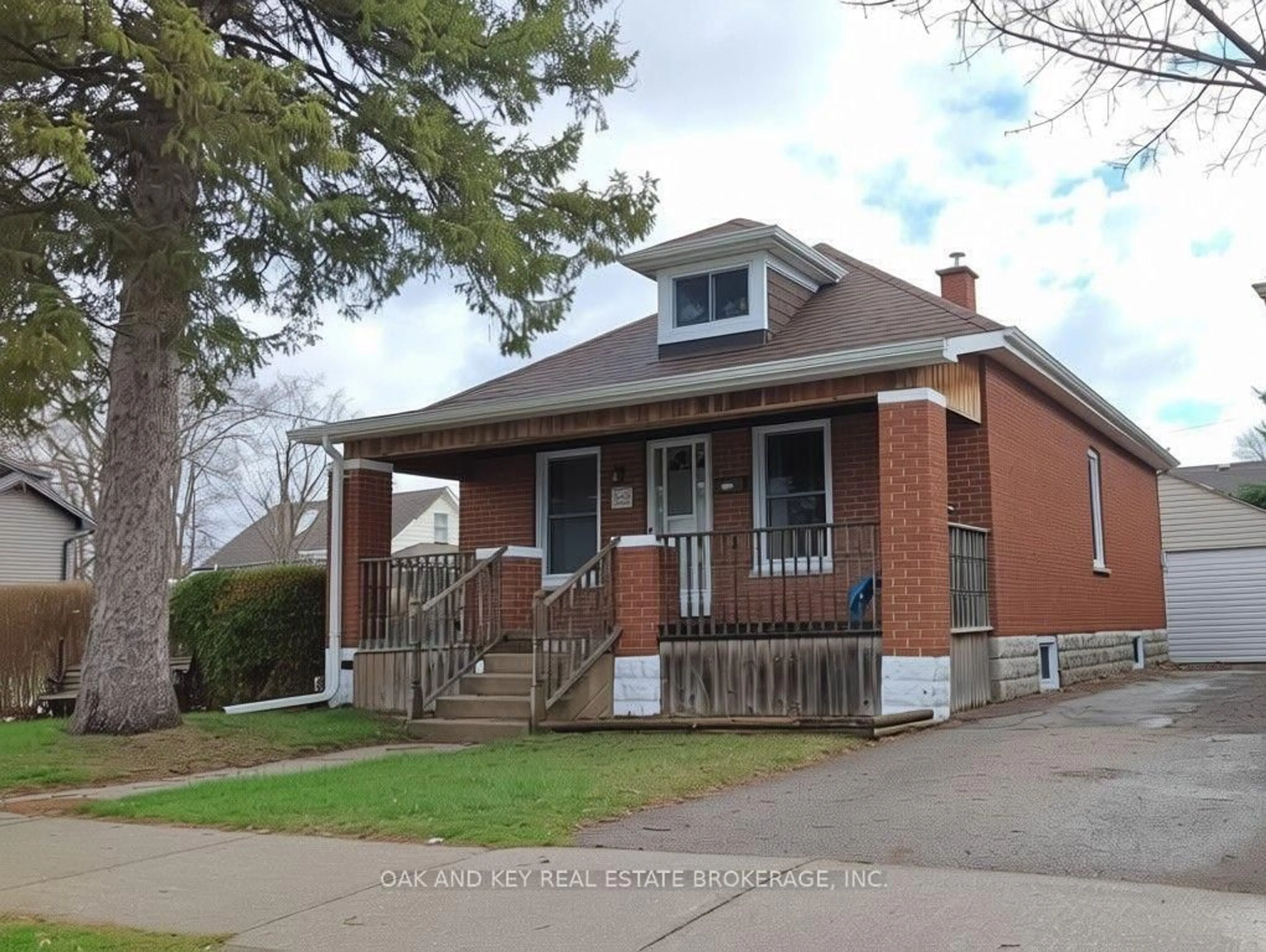 Home with brick exterior material, street for 32 Tennyson St, London East Ontario N5Z 2K7