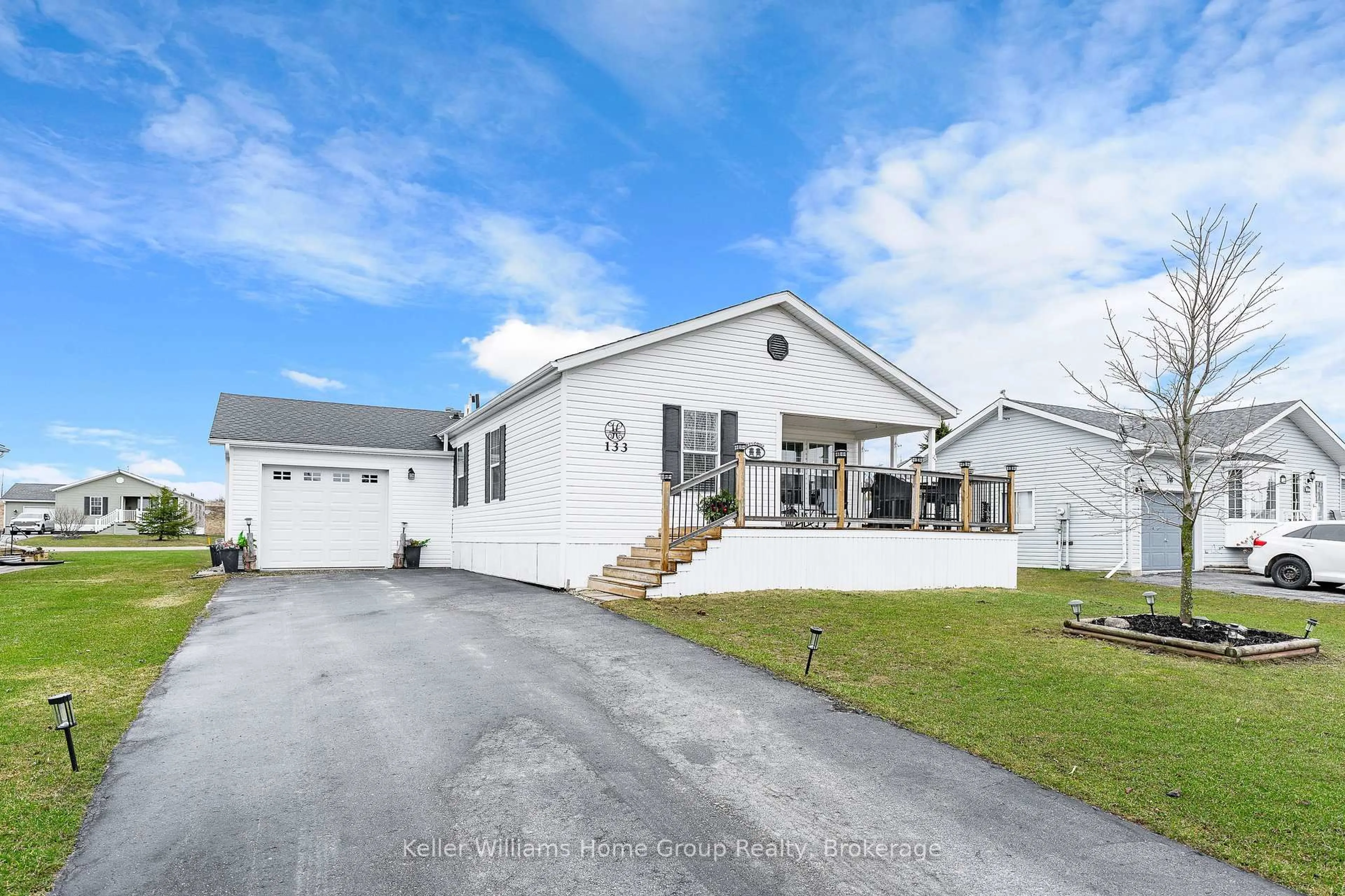 Home with vinyl exterior material, street for 133 Parkview Circ, Wellington North Ontario N0G 2K0