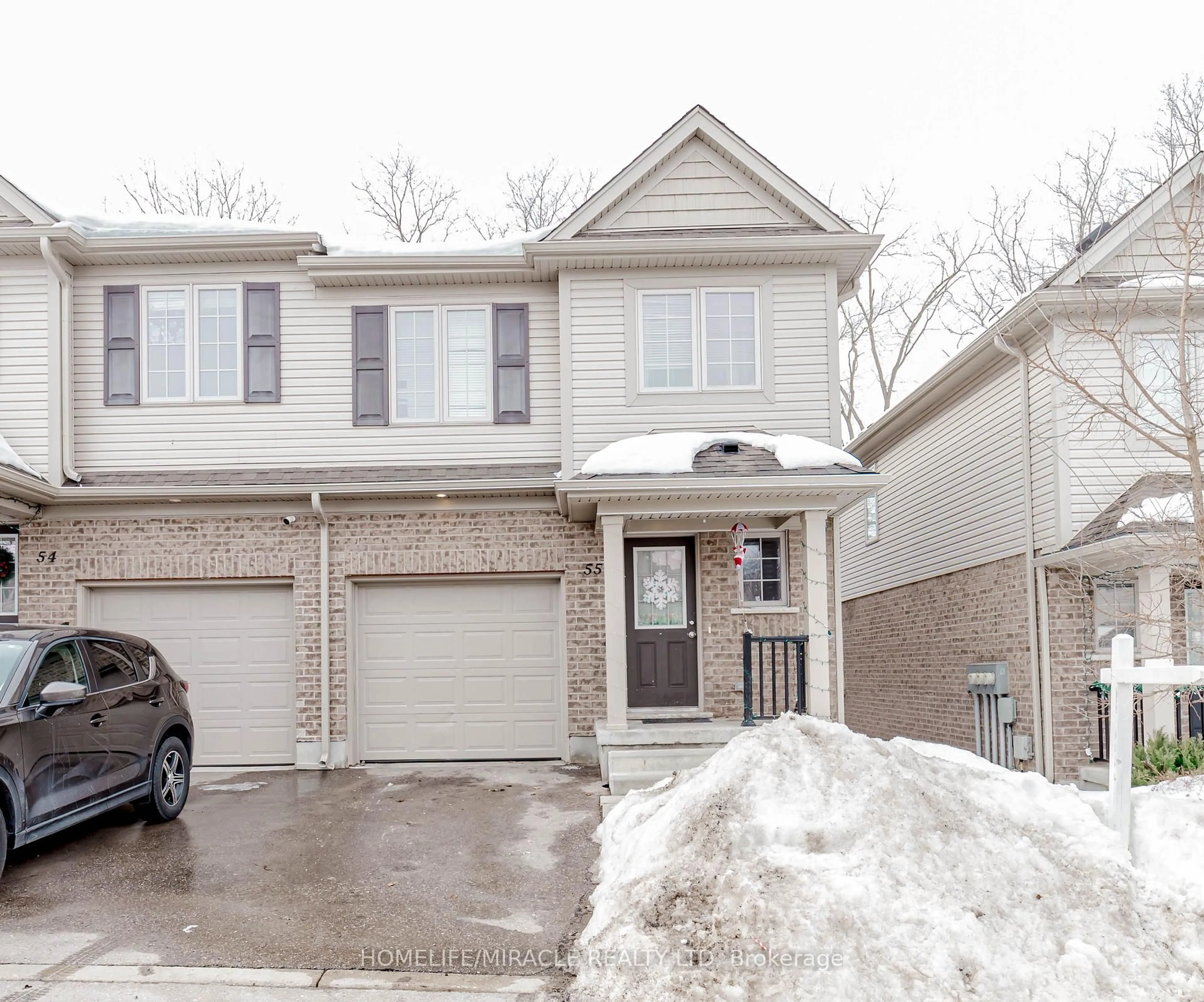 Home with brick exterior material, street for 50 Pinnacle Dr #55, Kitchener Ontario N2P 0H8