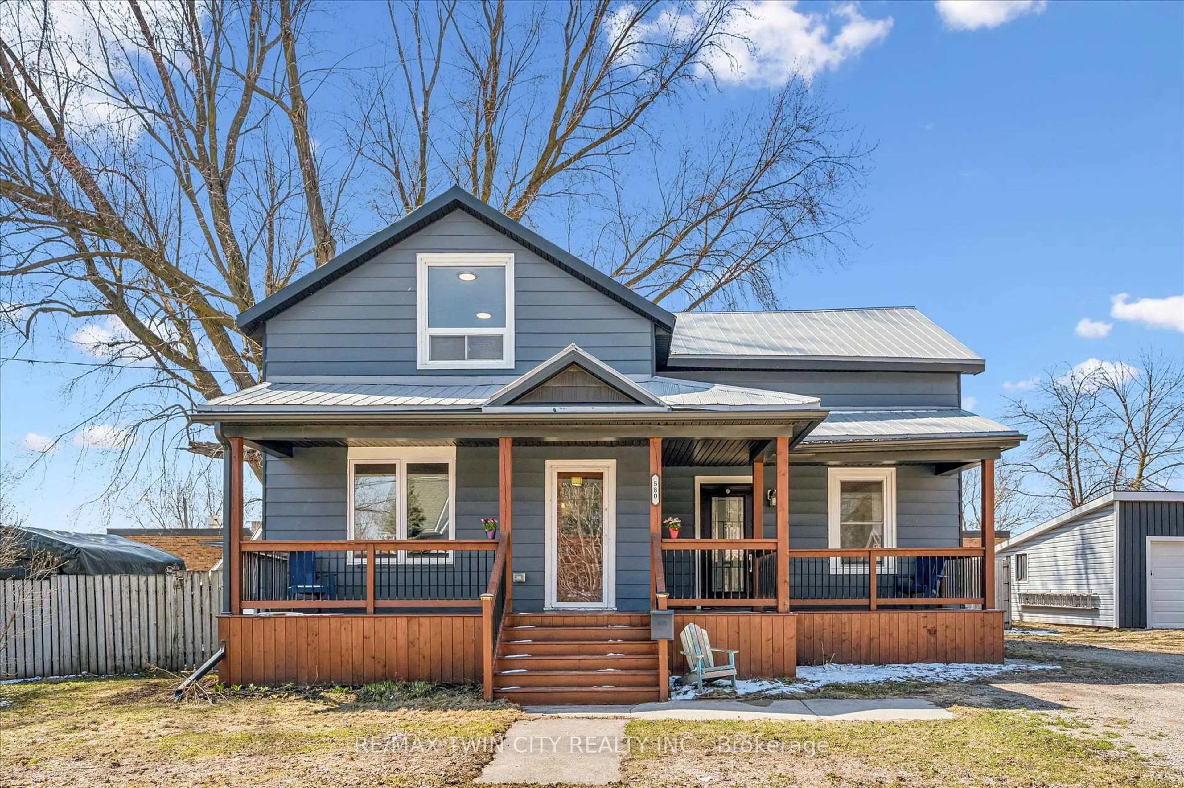 Home with vinyl exterior material, street for 580 MAIN St, North Perth Ontario N4W 2C6