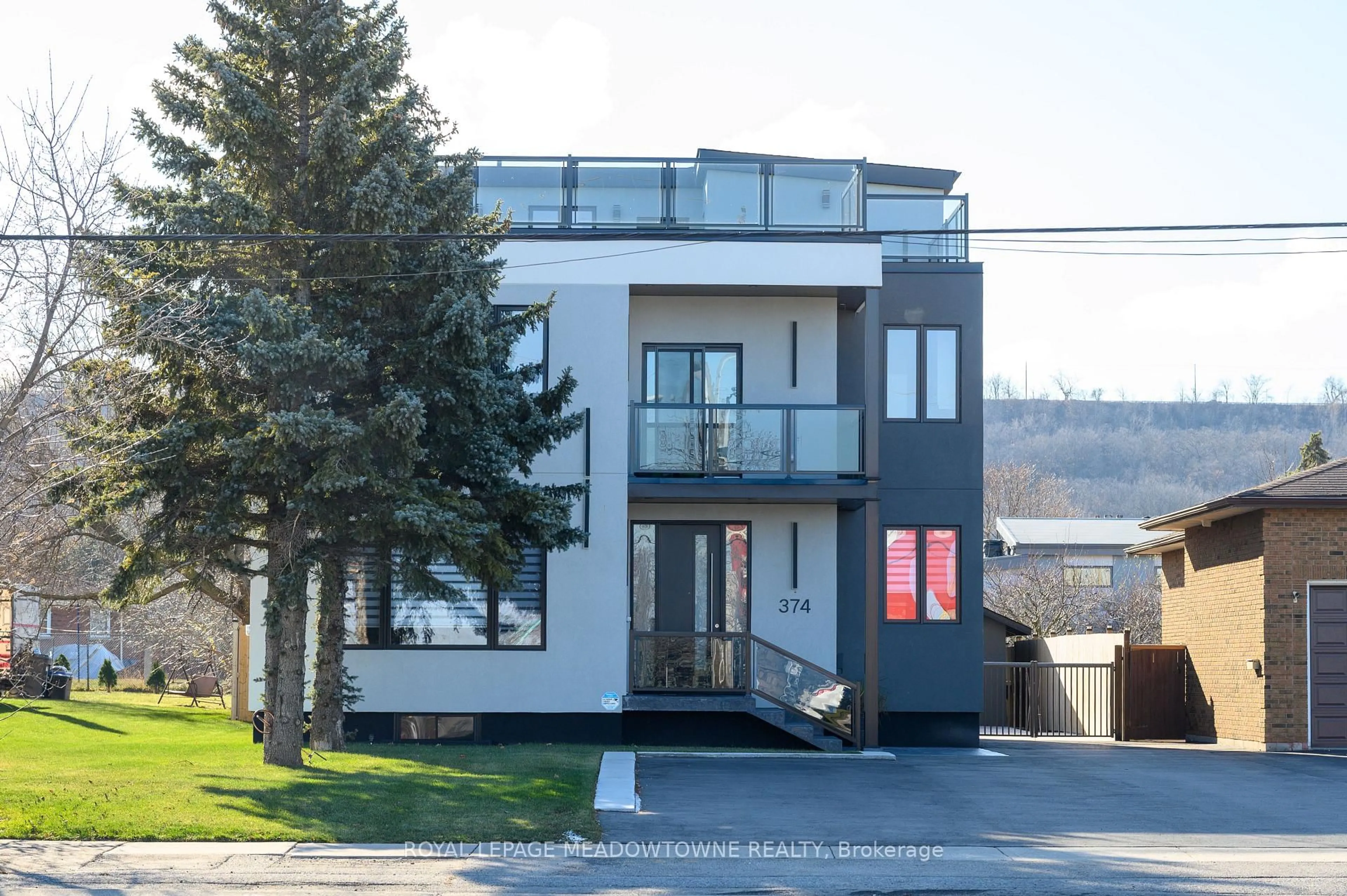 Home with vinyl exterior material, street for 374 Highway 8, Hamilton Ontario L8G 2E8