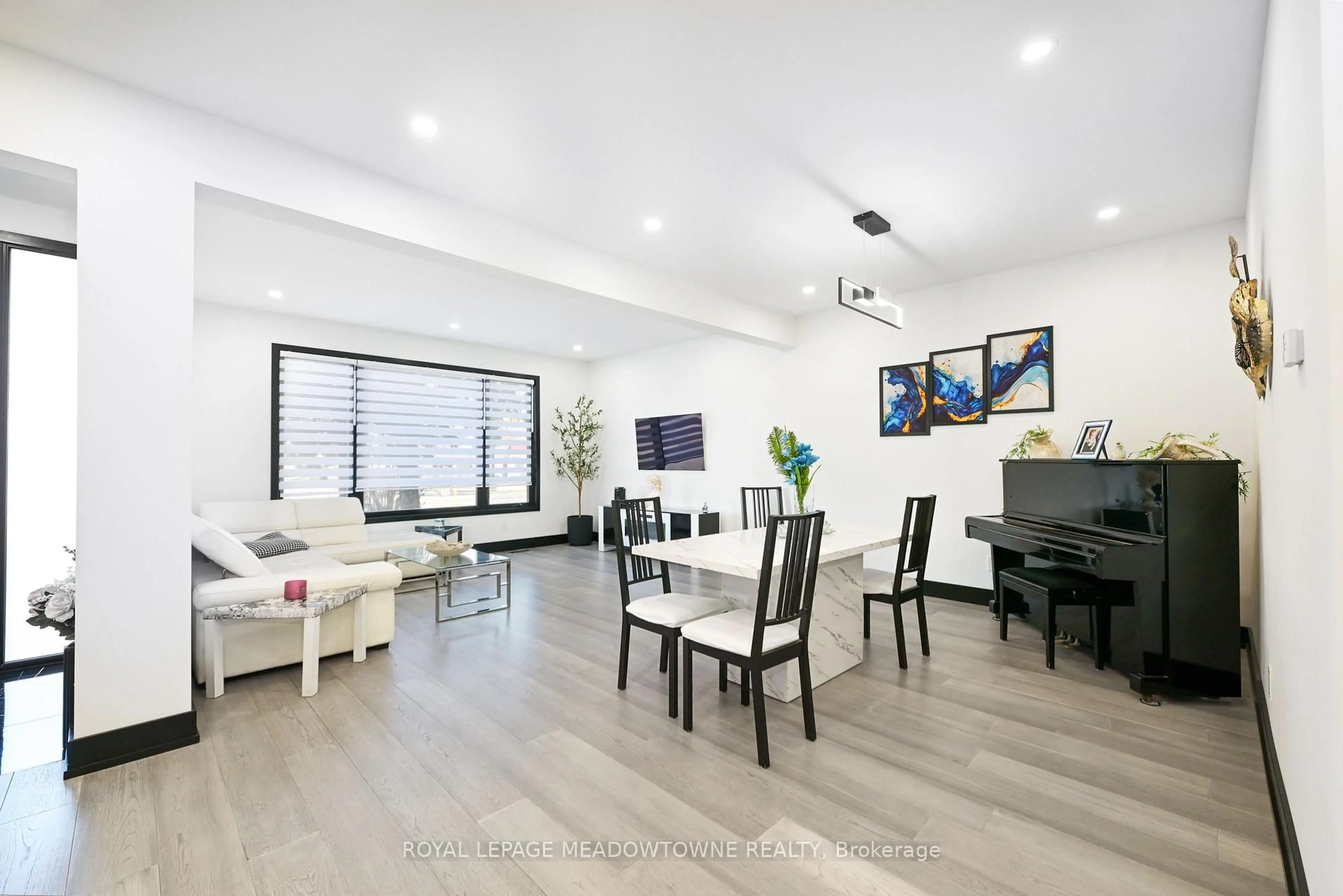 Living room with furniture, wood/laminate floor for 374 Highway 8, Hamilton Ontario L8G 2E8