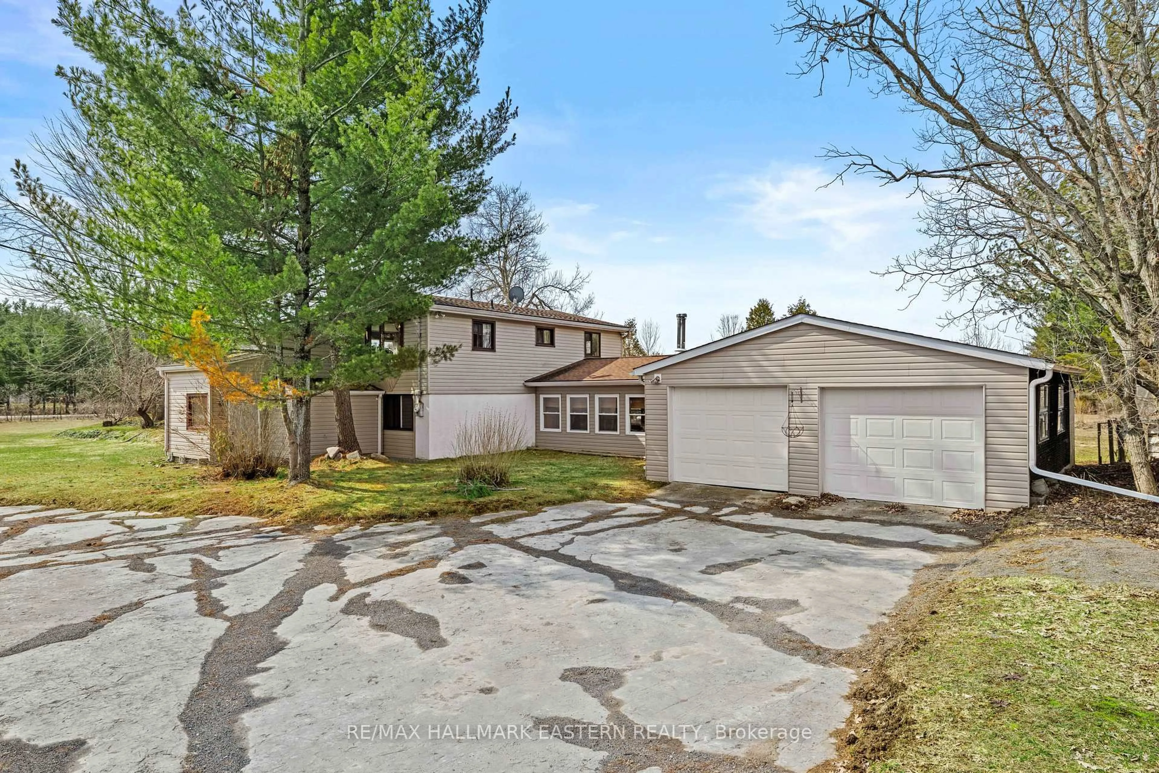 A pic from outside/outdoor area/front of a property/back of a property/a pic from drone, street for 700 Golf Course Rd, Douro-Dummer Ontario K0L 2H0