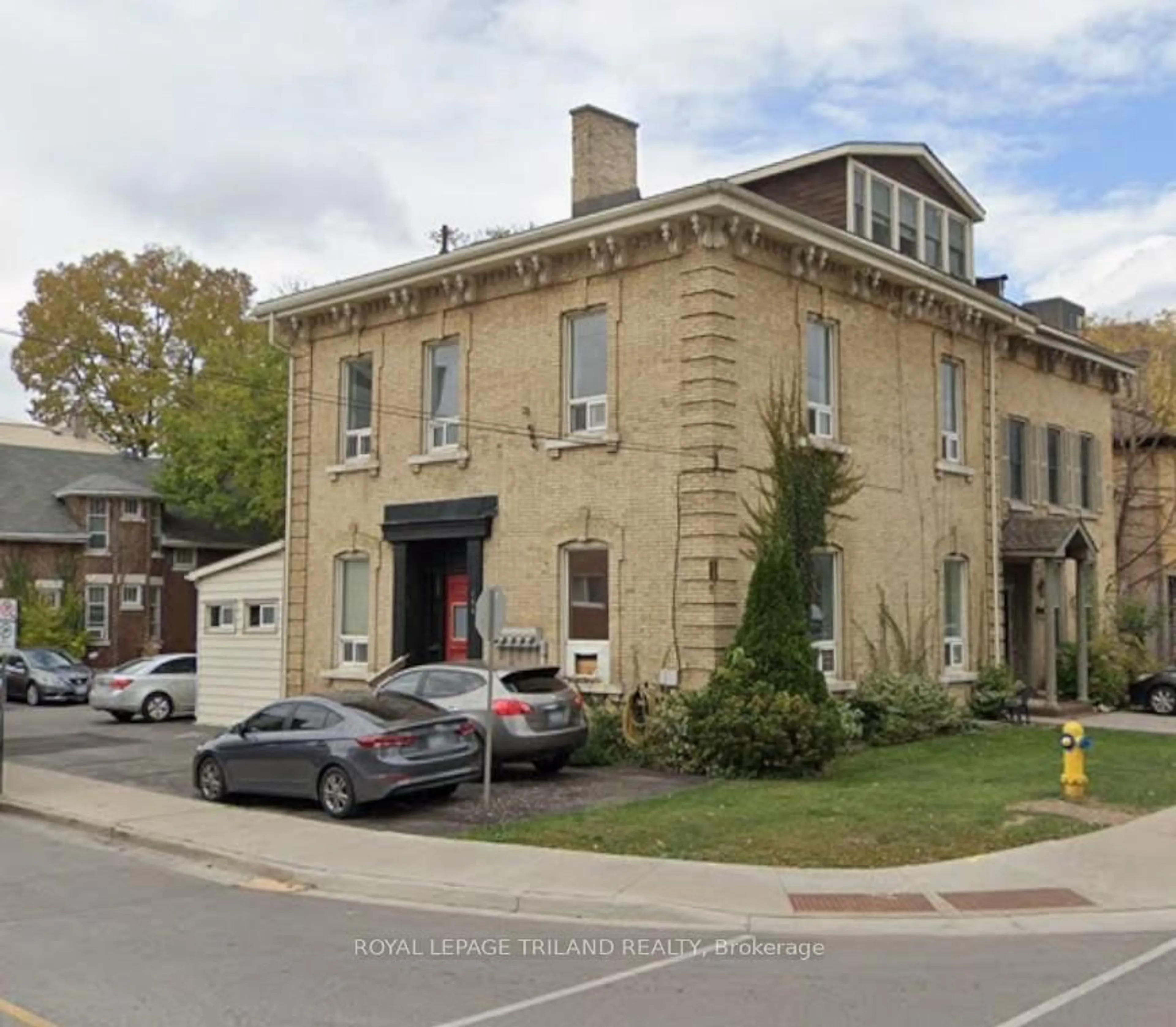 Home with brick exterior material, building for 106 Kent St, London East Ontario N6A 1L1