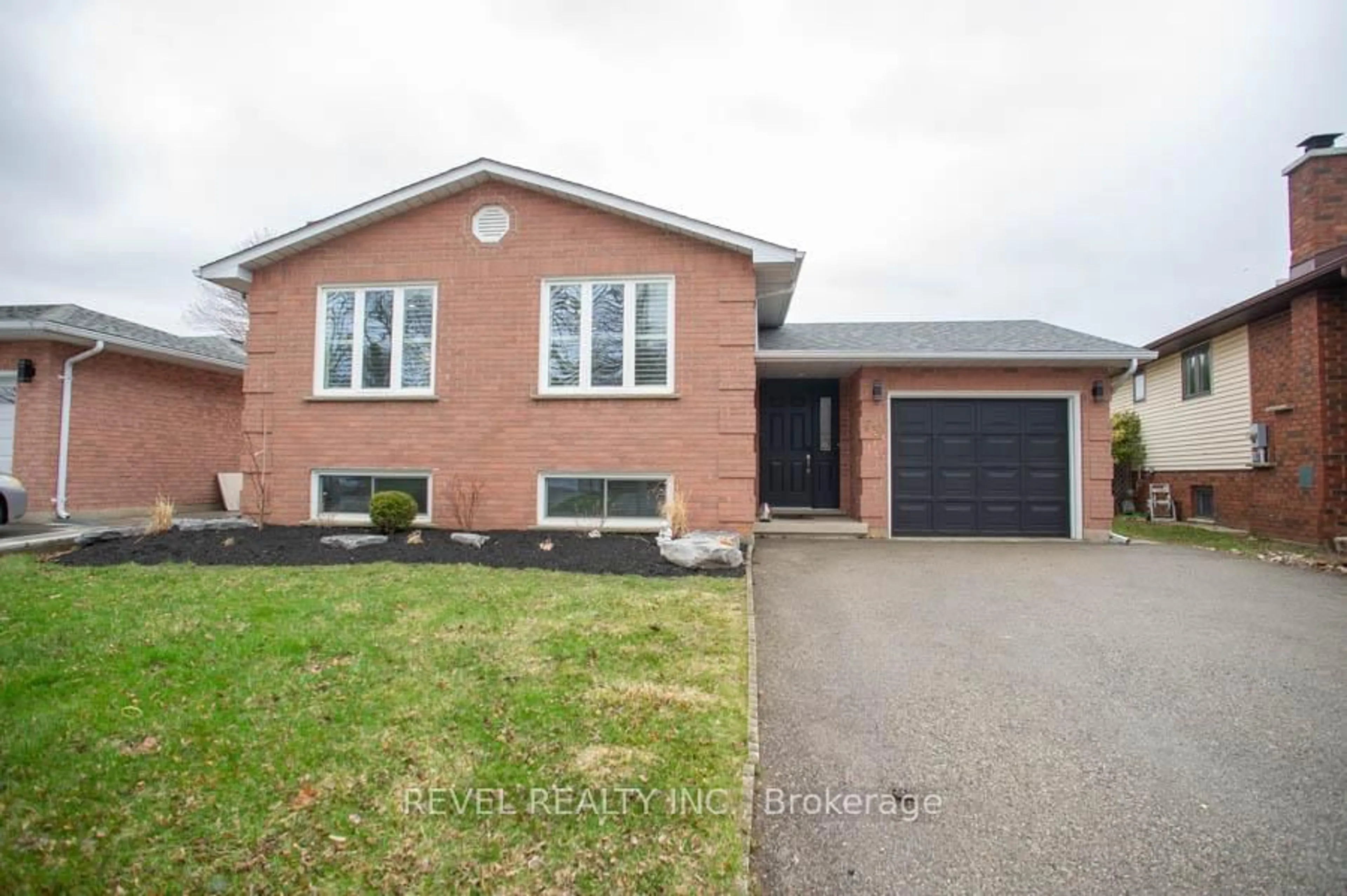 Home with brick exterior material, street for 73 Gillin Rd, Brantford Ontario N3P 1X2
