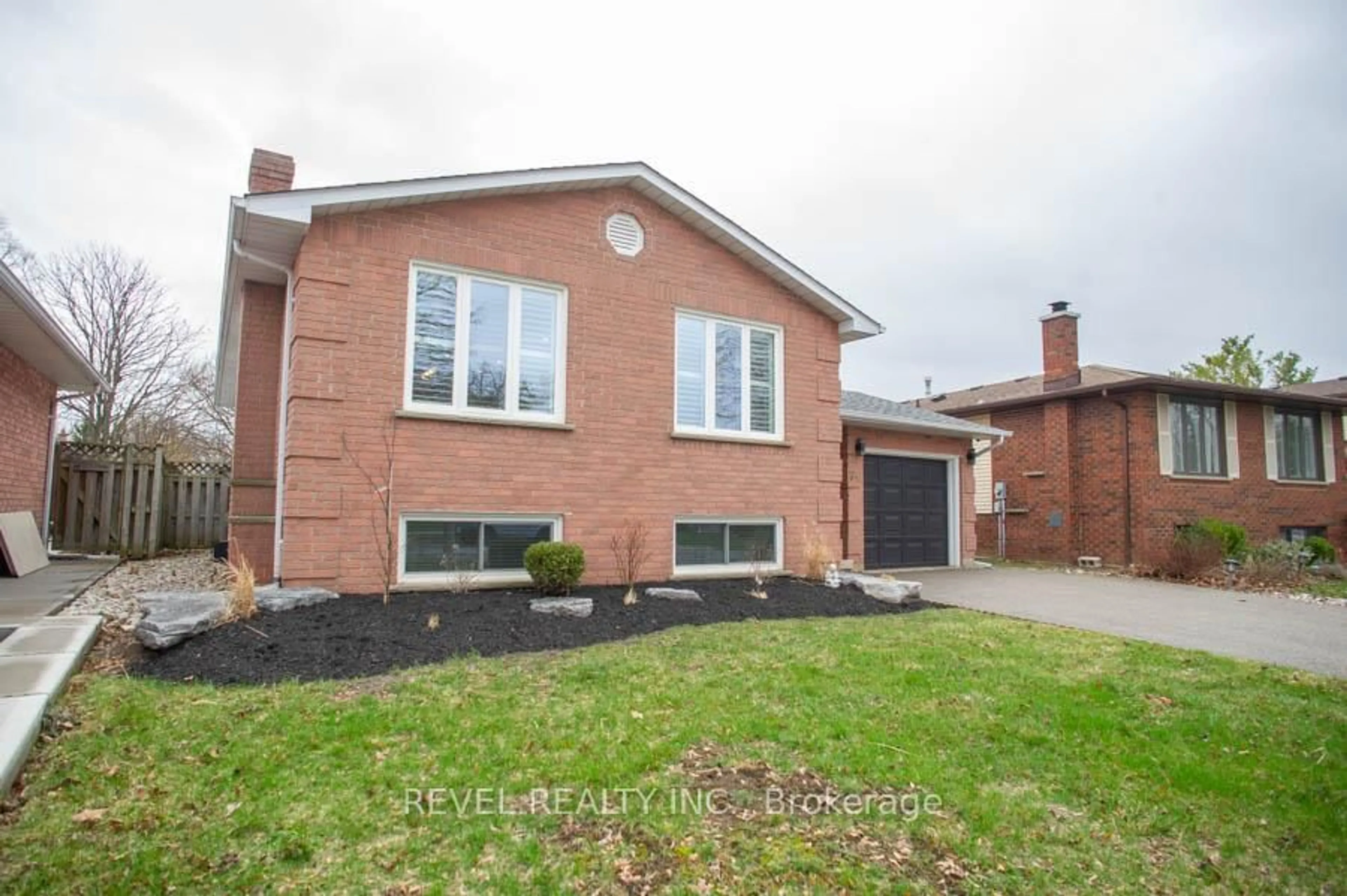 Home with brick exterior material, street for 73 Gillin Rd, Brantford Ontario N3P 1X2