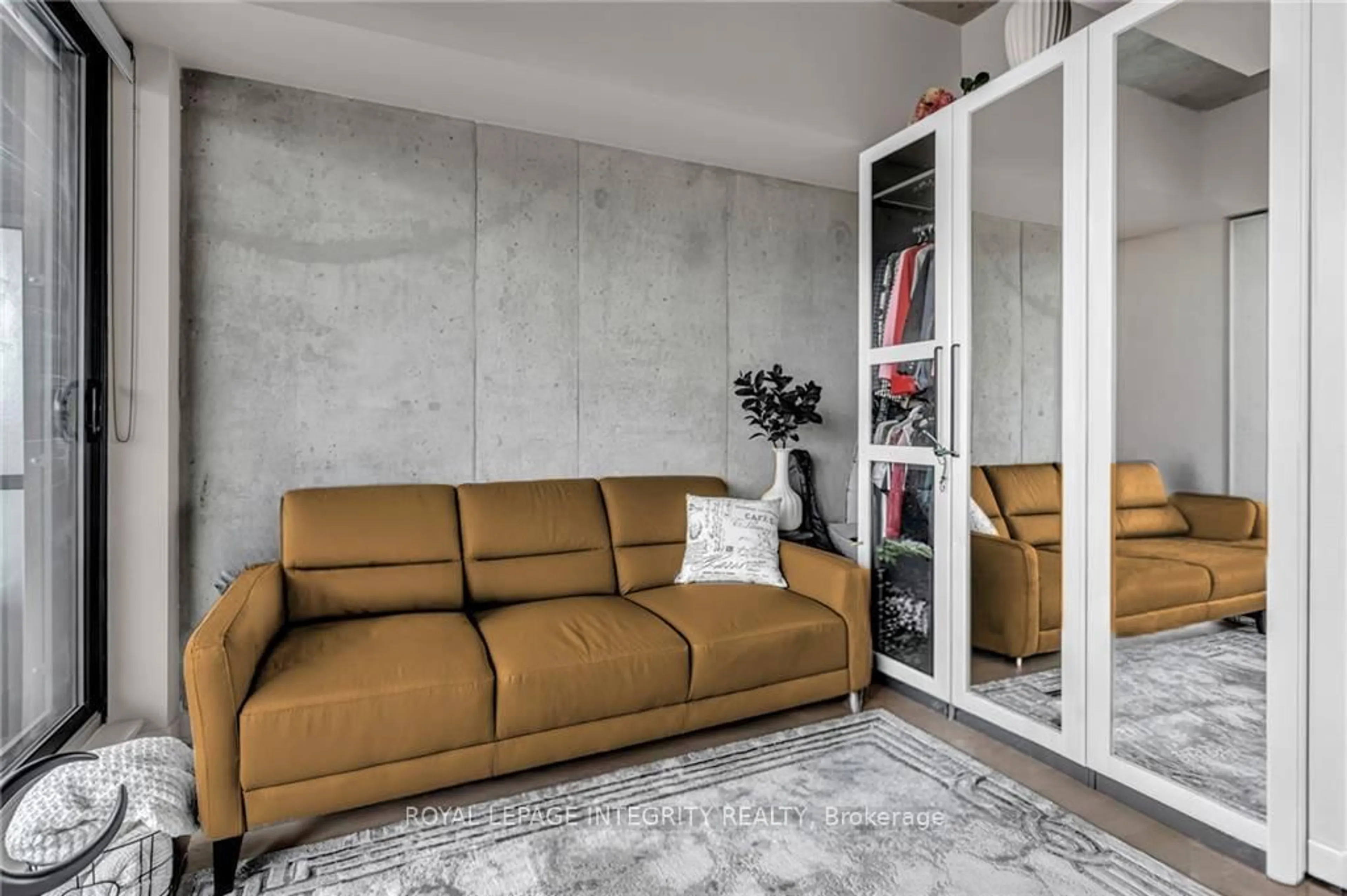 Living room with furniture, cement floor for 203 CATHERINE St #1006, Ottawa Ontario K2P 1J5