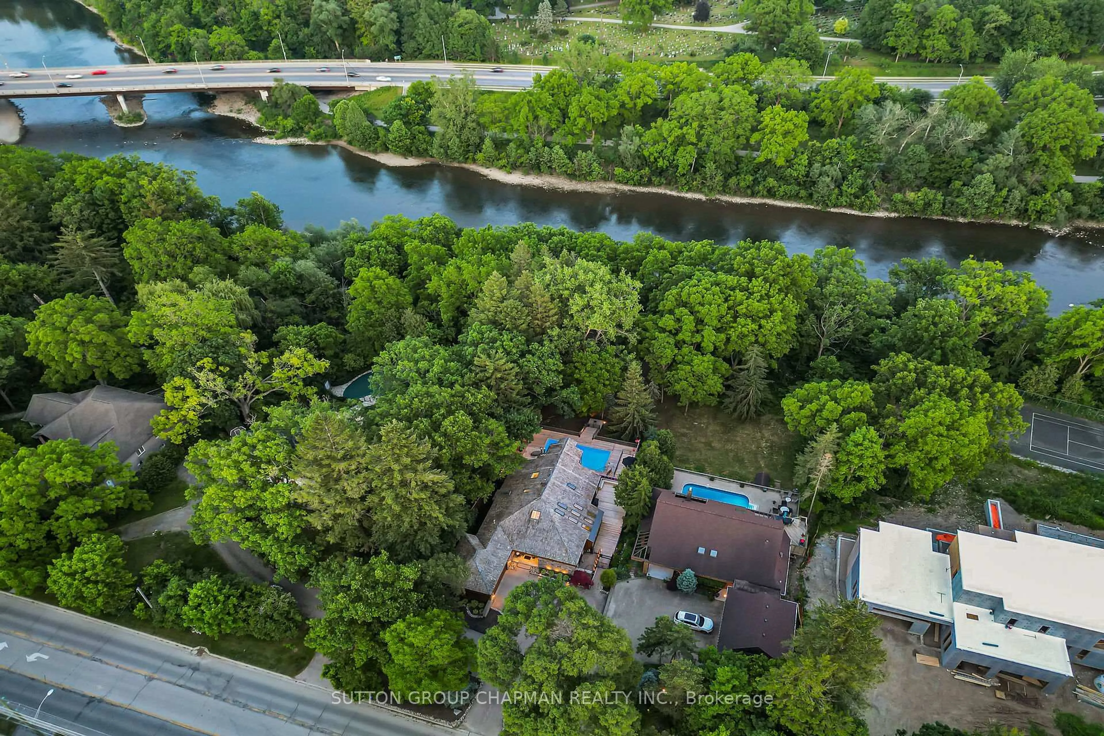 A pic from outside/outdoor area/front of a property/back of a property/a pic from drone, water/lake/river/ocean view for 712 Riverside Dr, London North Ontario N6H 2S4