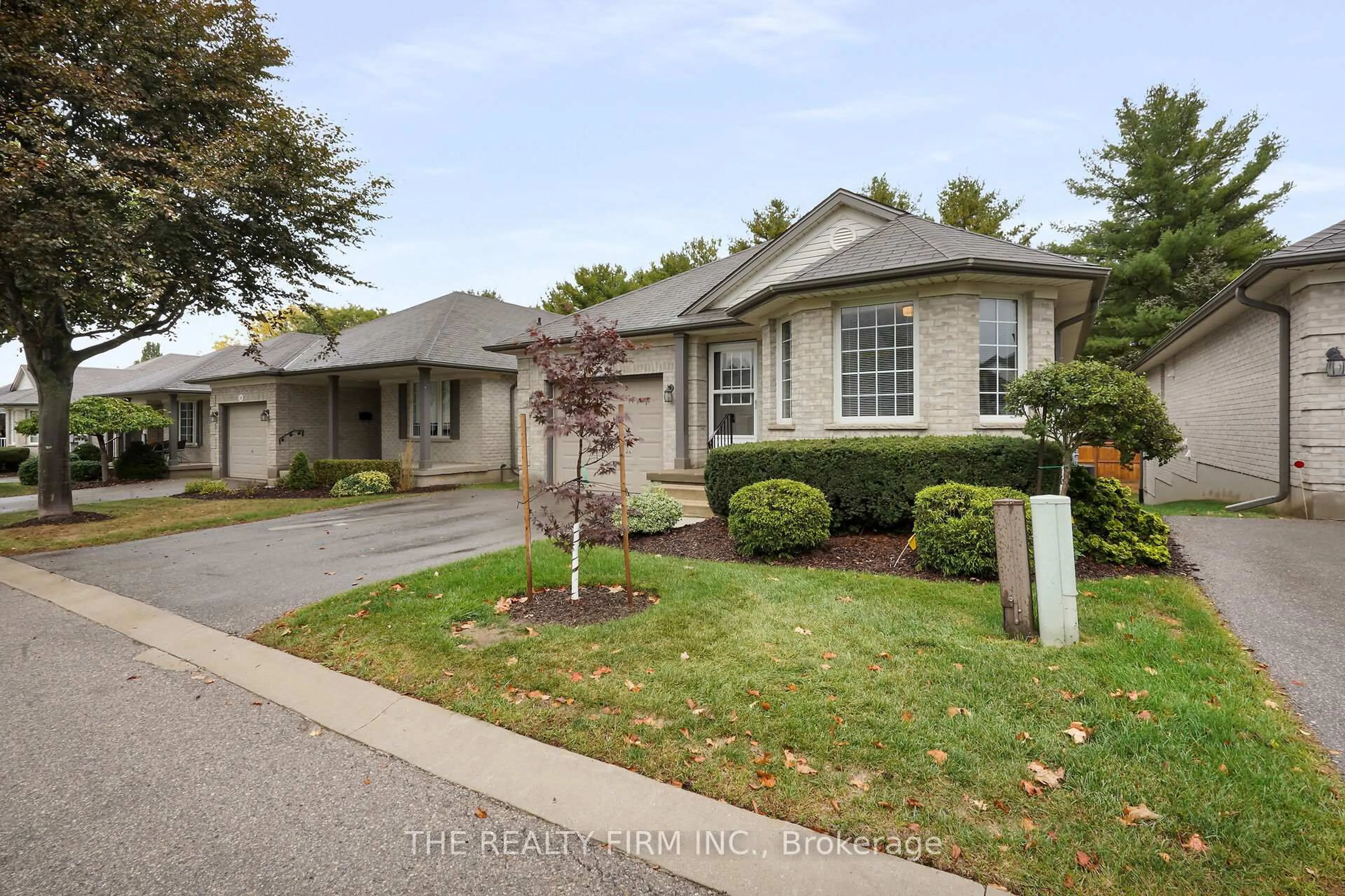 Home with brick exterior material, street for 20 Windemere Pl #17, St. Thomas Ontario N5R 6H6