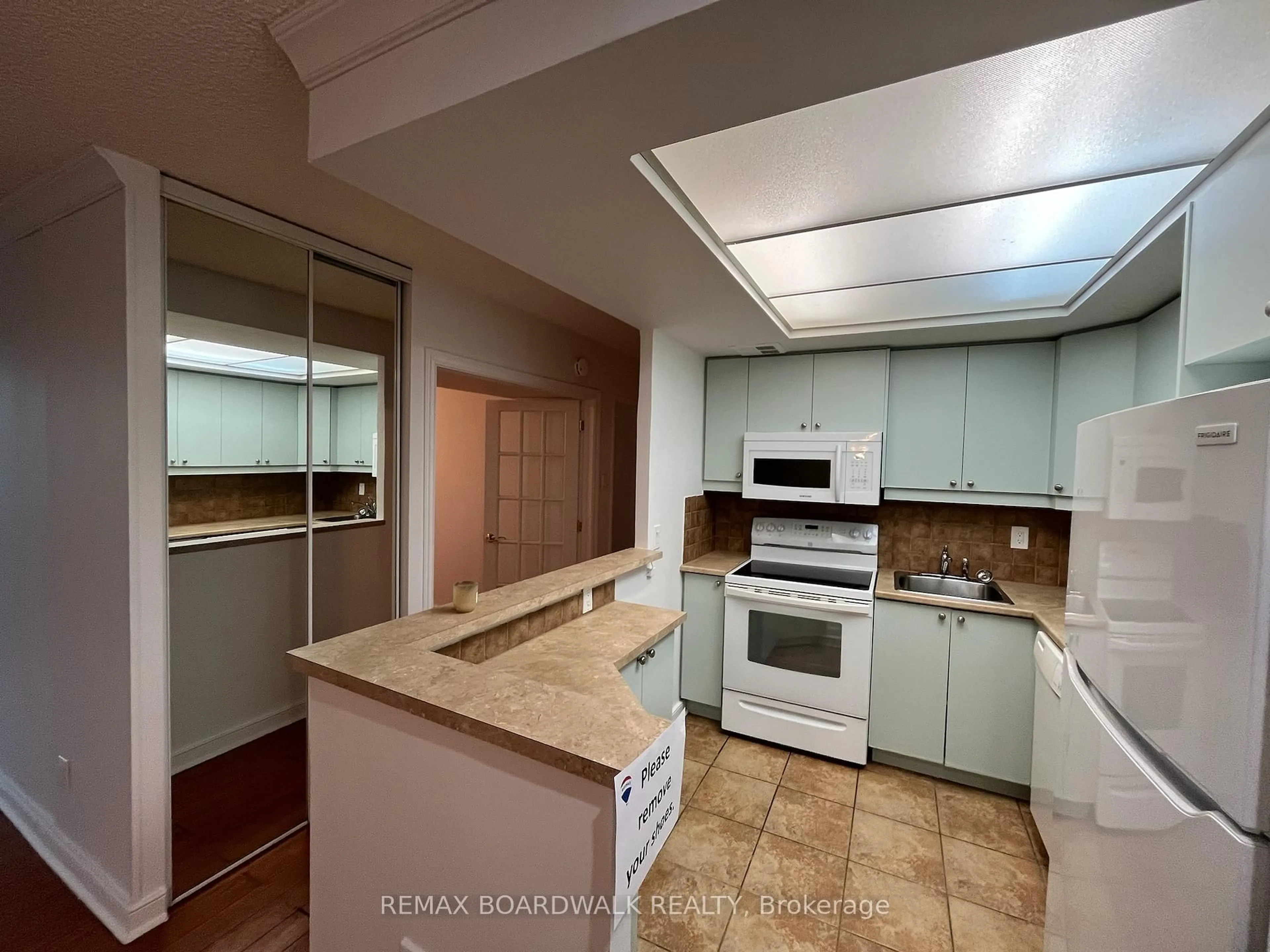 Standard kitchen, ceramic/tile floor for 555 Brittany Dr #403, Ottawa Ontario K1K 4C5