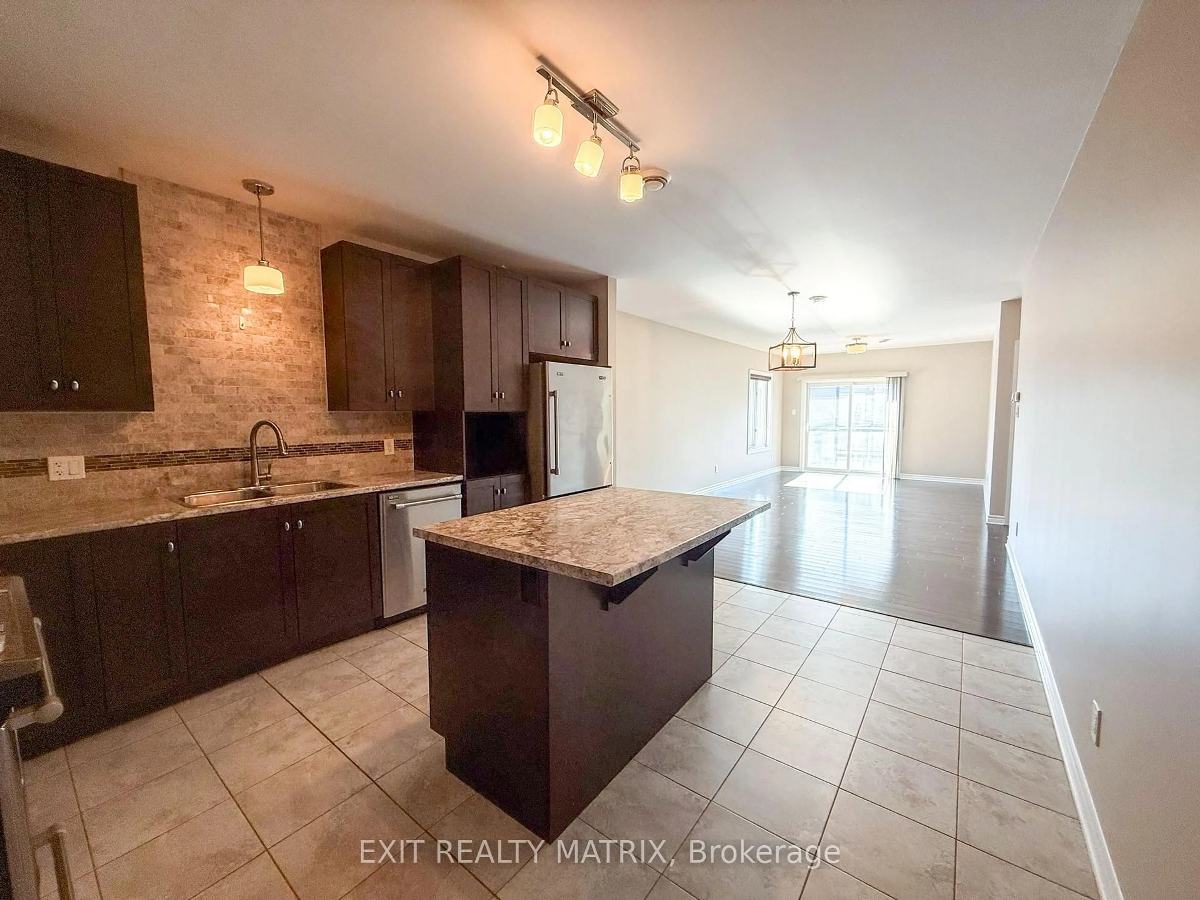 Open concept kitchen, ceramic/tile floor for 300 Solstice Cres #305, Russell Ontario K0A 1W0