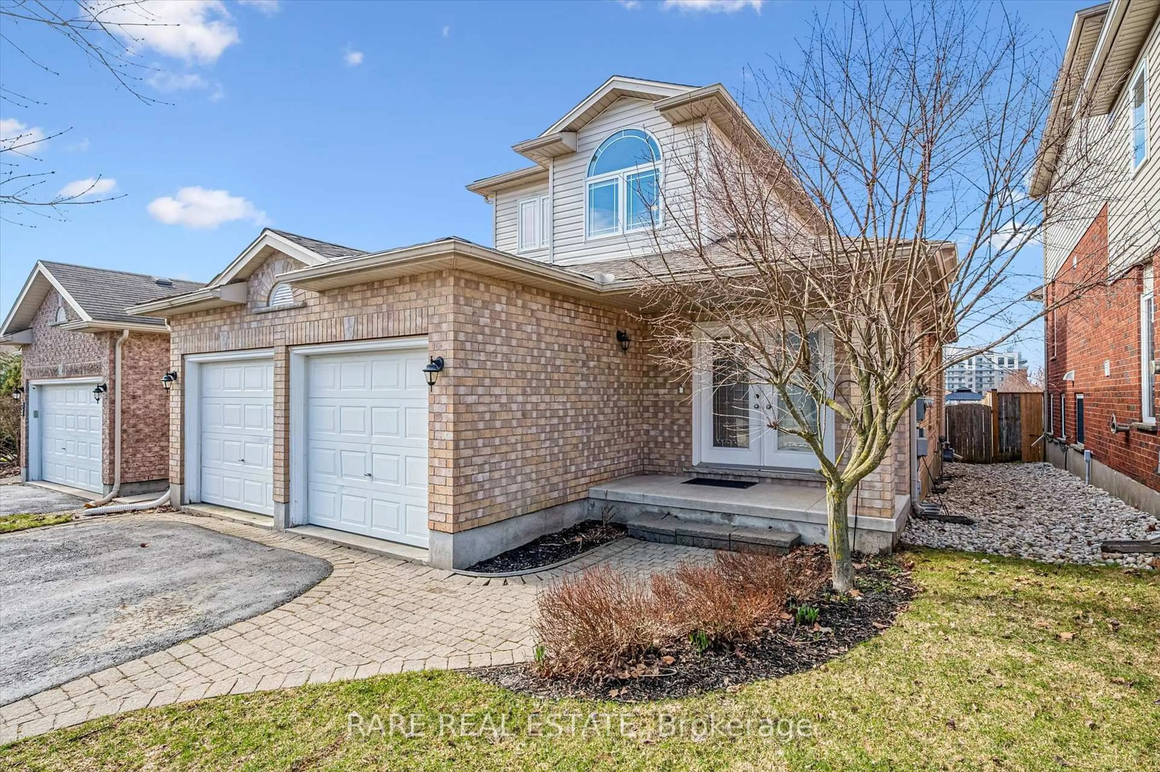 Home with brick exterior material, street for 28 Davis St, Guelph Ontario N1E 0A1