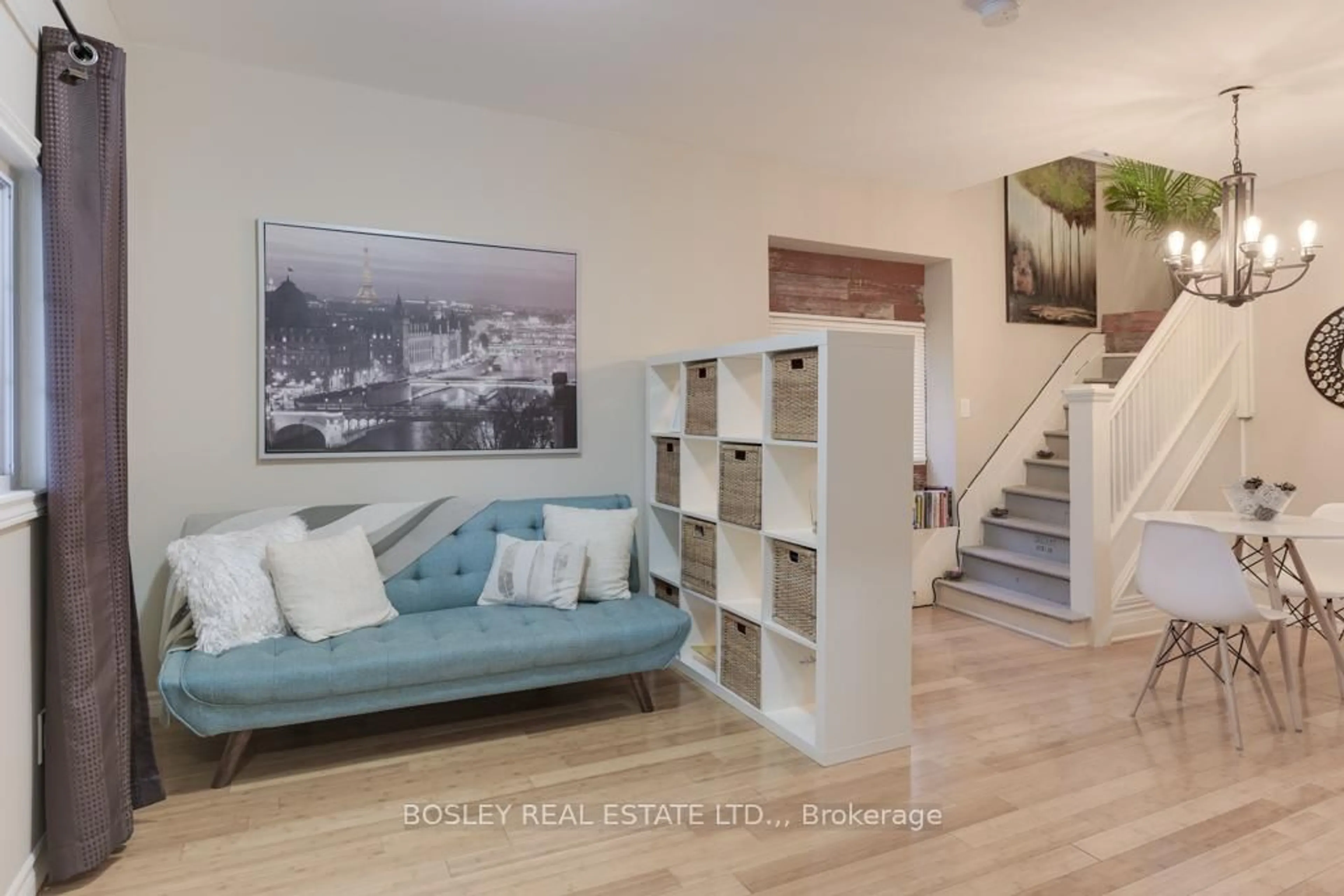 Living room with furniture, wood/laminate floor for 29 Russell Ave, St. Catharines Ontario L2R 1V4