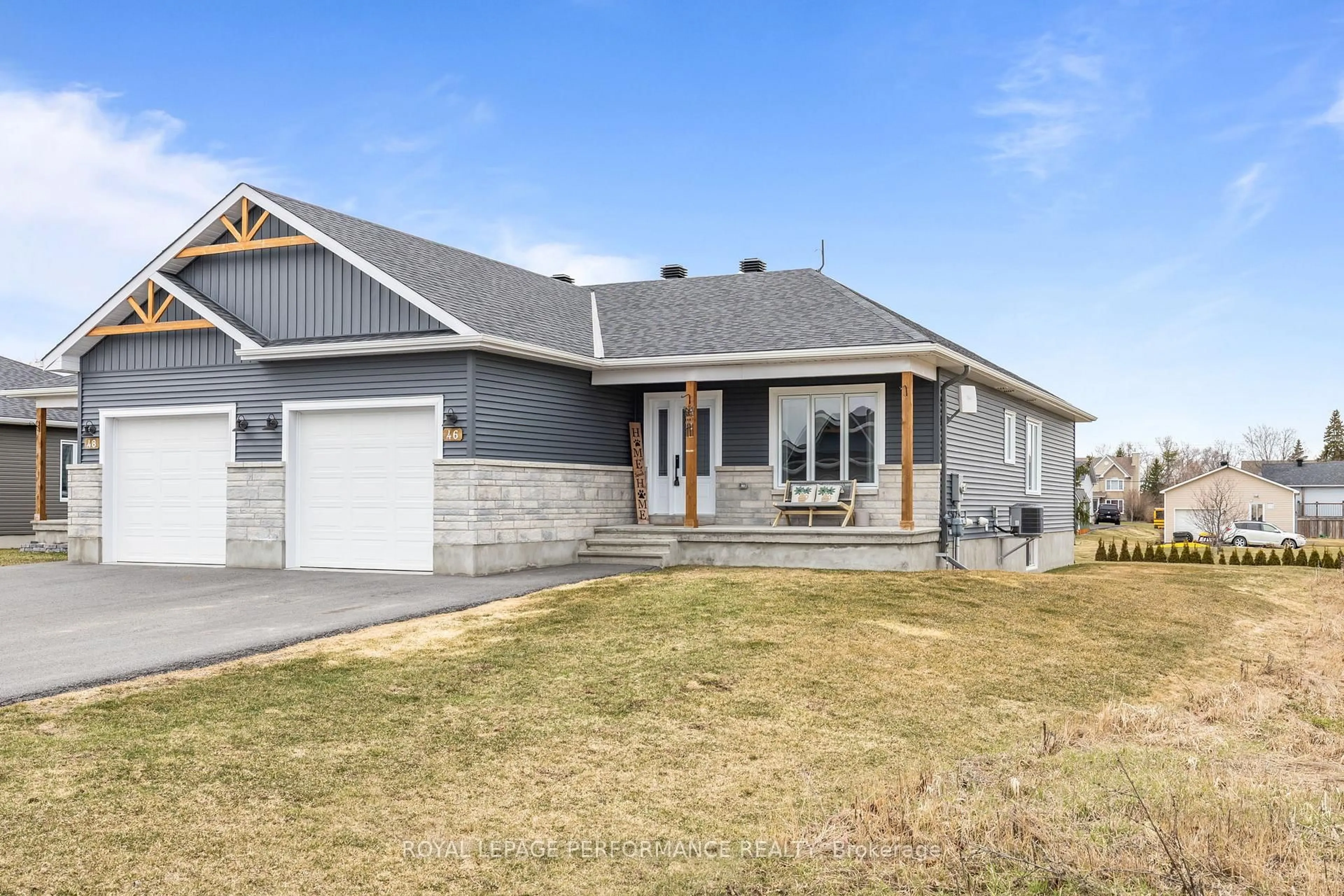 Home with vinyl exterior material, street for 46 Adam St, The Nation Ontario K0A 3C0