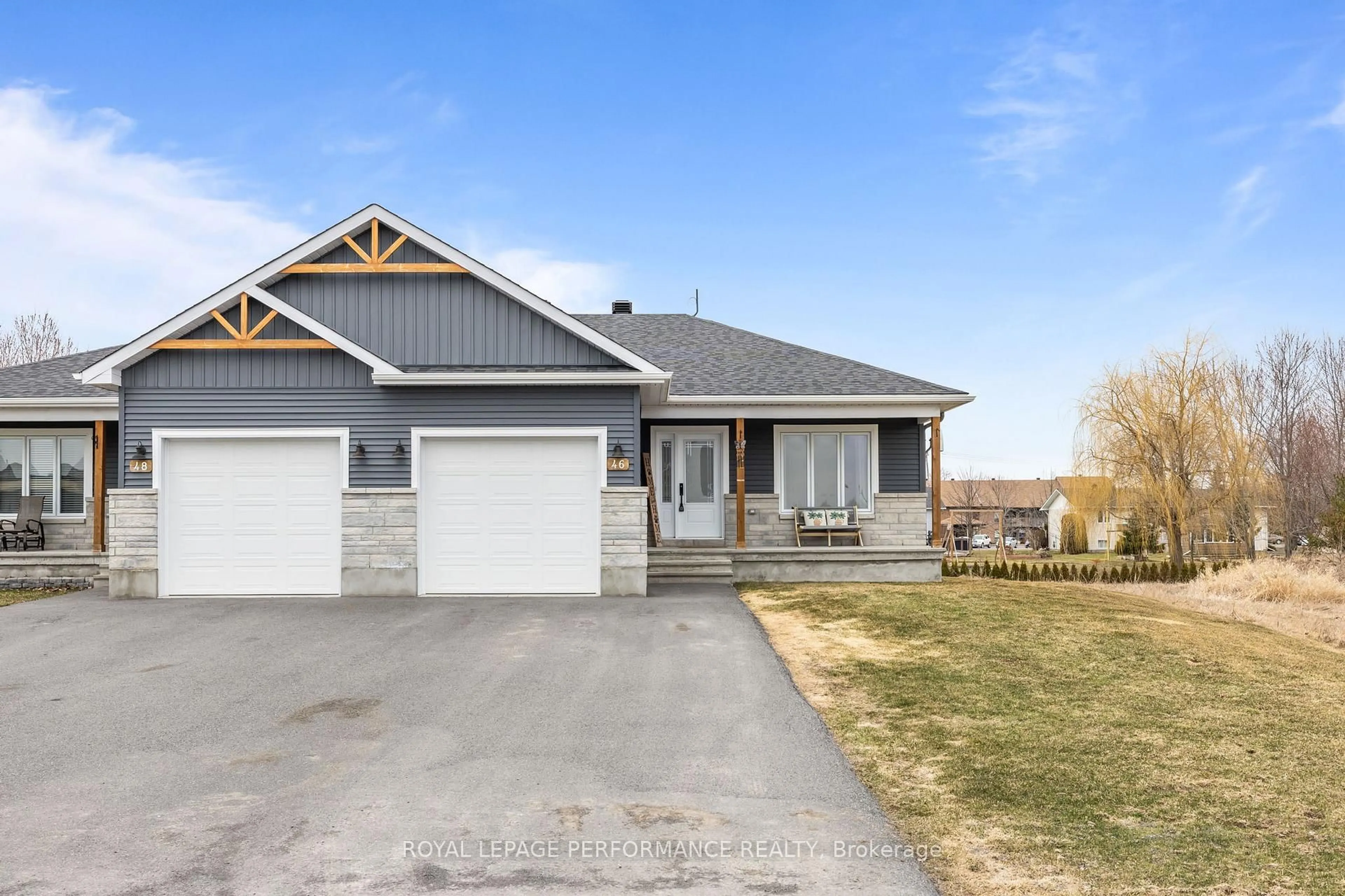 Home with vinyl exterior material, street for 46 Adam St, The Nation Ontario K0A 3C0