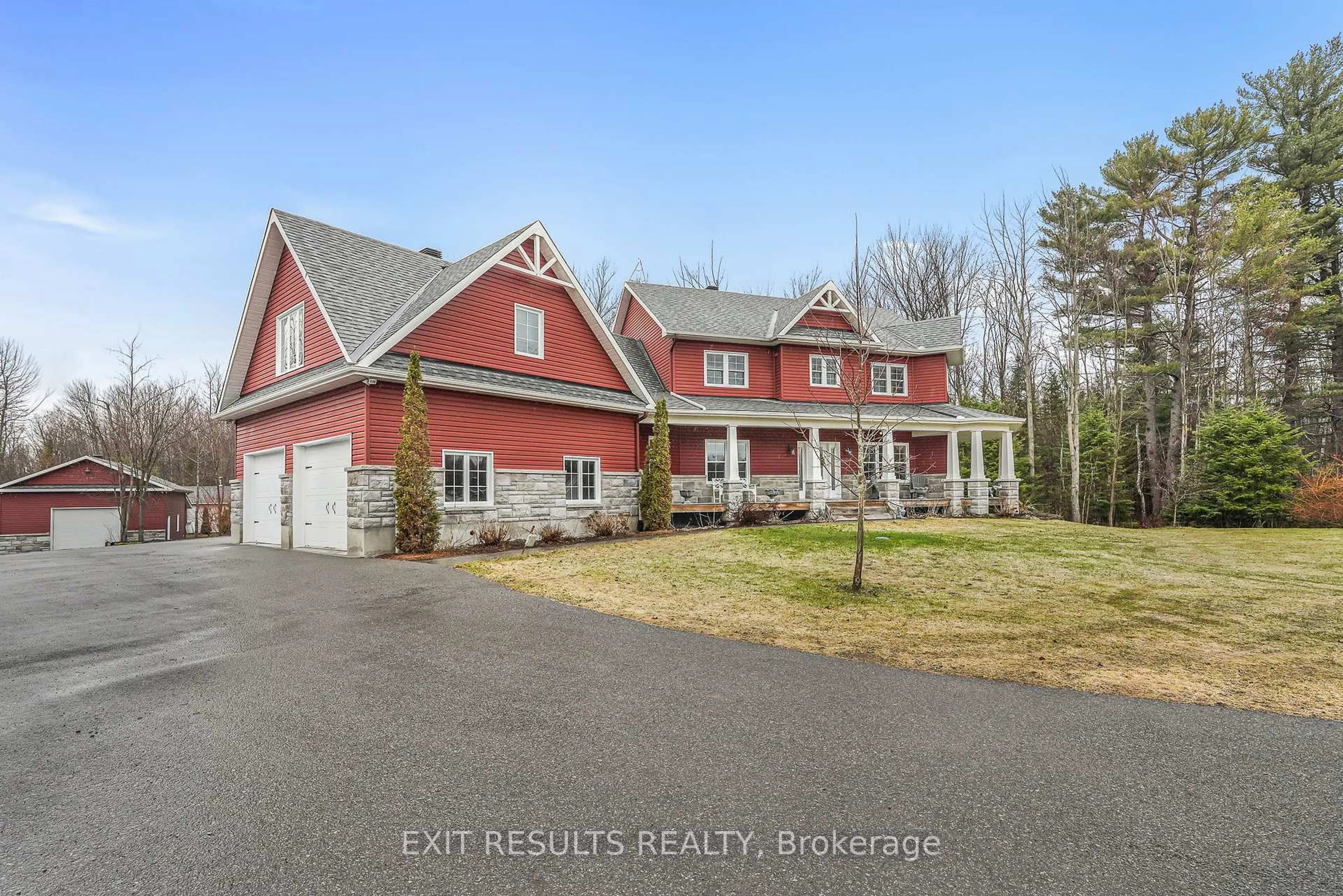 A pic from outside/outdoor area/front of a property/back of a property/a pic from drone, street for 5856 Dunning Rd, Navan Ontario K4B 1J1