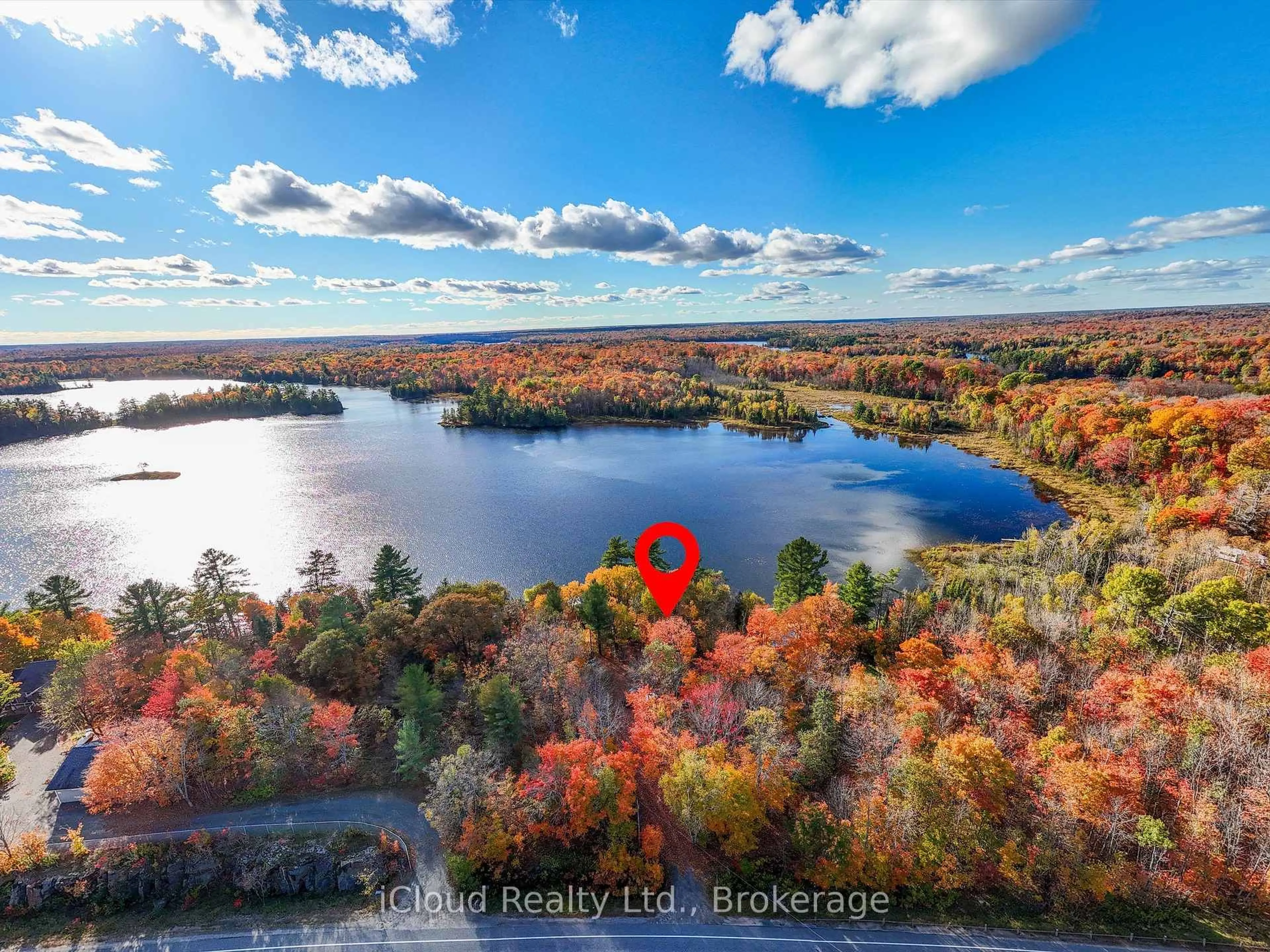 A pic from outside/outdoor area/front of a property/back of a property/a pic from drone, water/lake/river/ocean view for 1128 124 Highway, Whitestone Ontario P0A 1G0