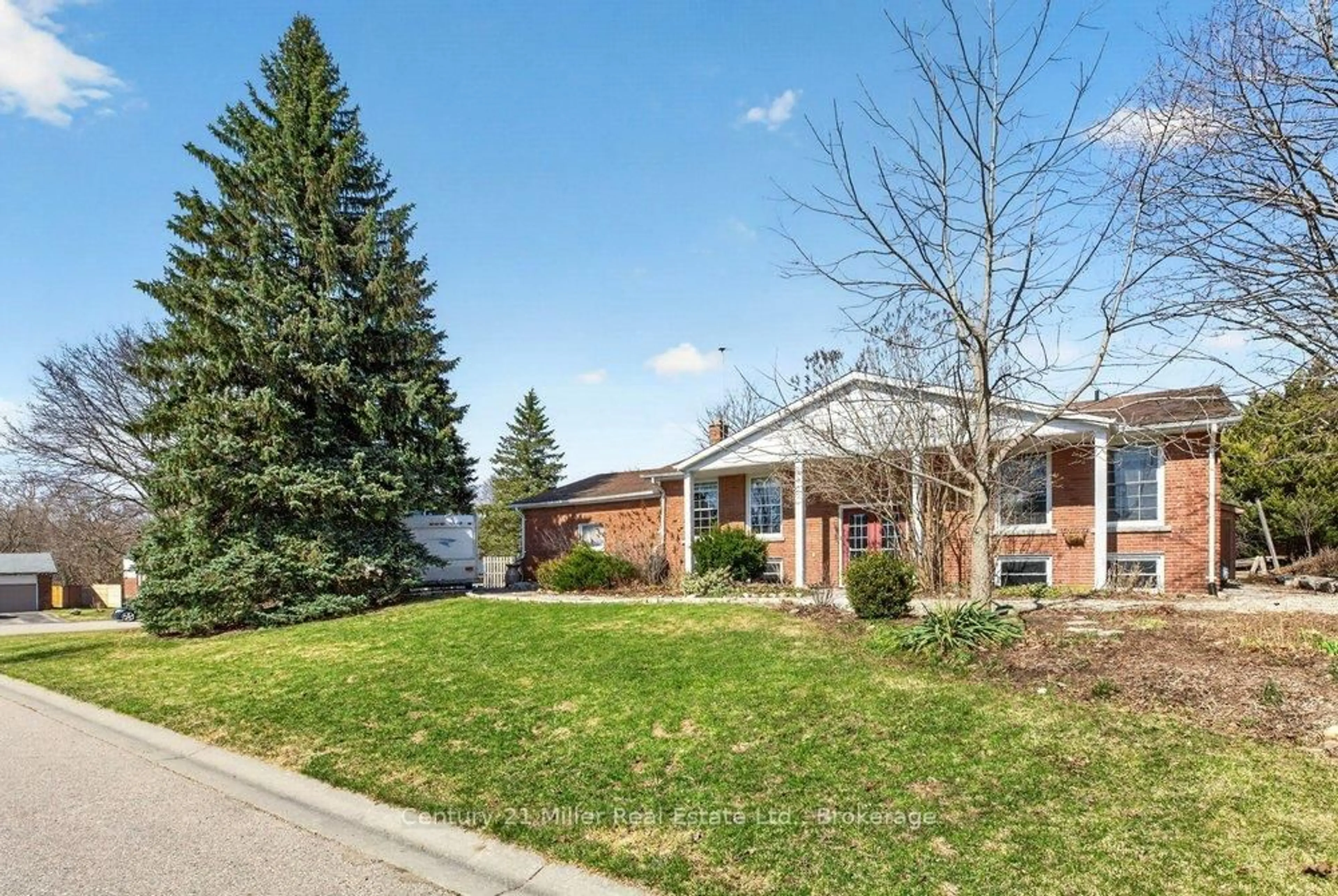 Home with brick exterior material, street for 86 Waterford Dr, Erin Ontario N0B 1T0