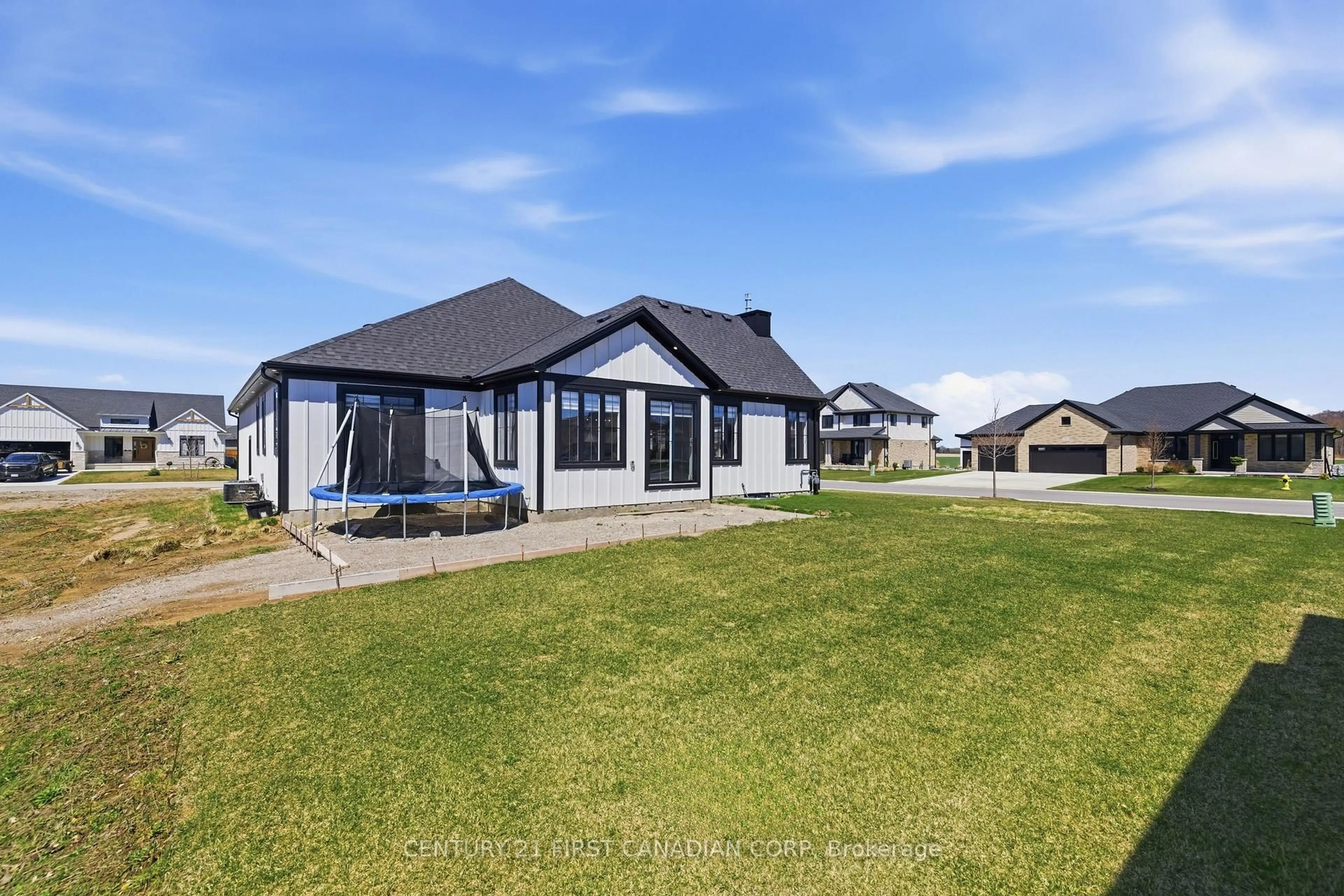 A pic from outside/outdoor area/front of a property/back of a property/a pic from drone, unknown for 101 Harvest Lane, Dutton/Dunwich Ontario N0L 1J0