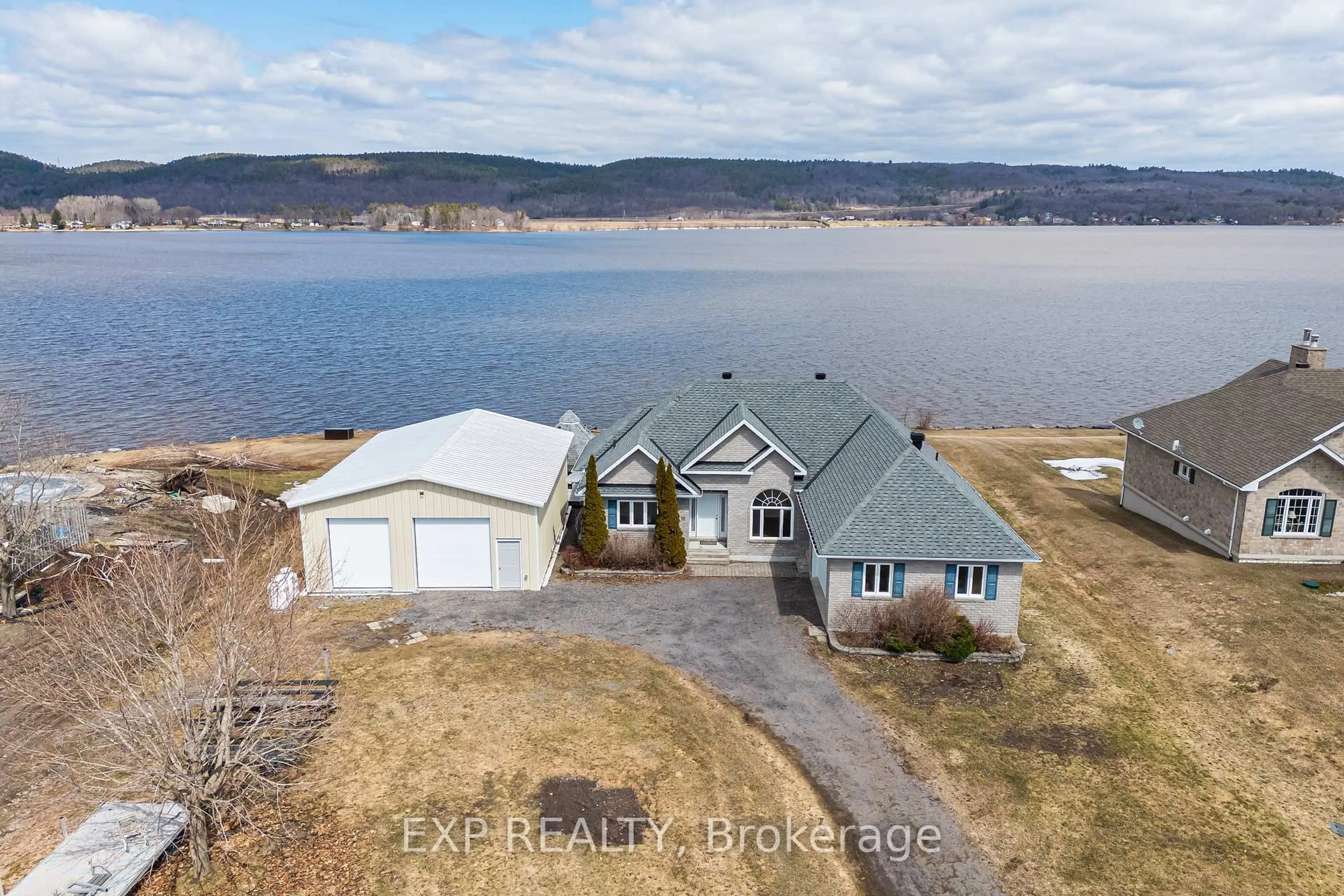 A pic from outside/outdoor area/front of a property/back of a property/a pic from drone, water/lake/river/ocean view for 15 Rue Haute Rive St, Alfred and Plantagenet Ontario K0B 1J0