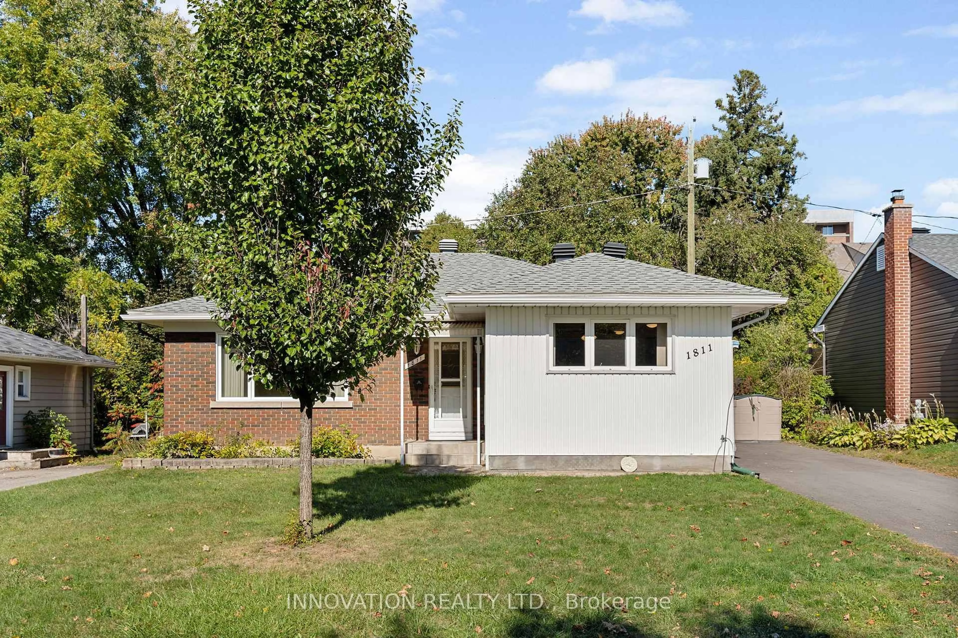Home with brick exterior material, street for 1811 Hutton Ave, Ottawa Ontario K1G 1M1