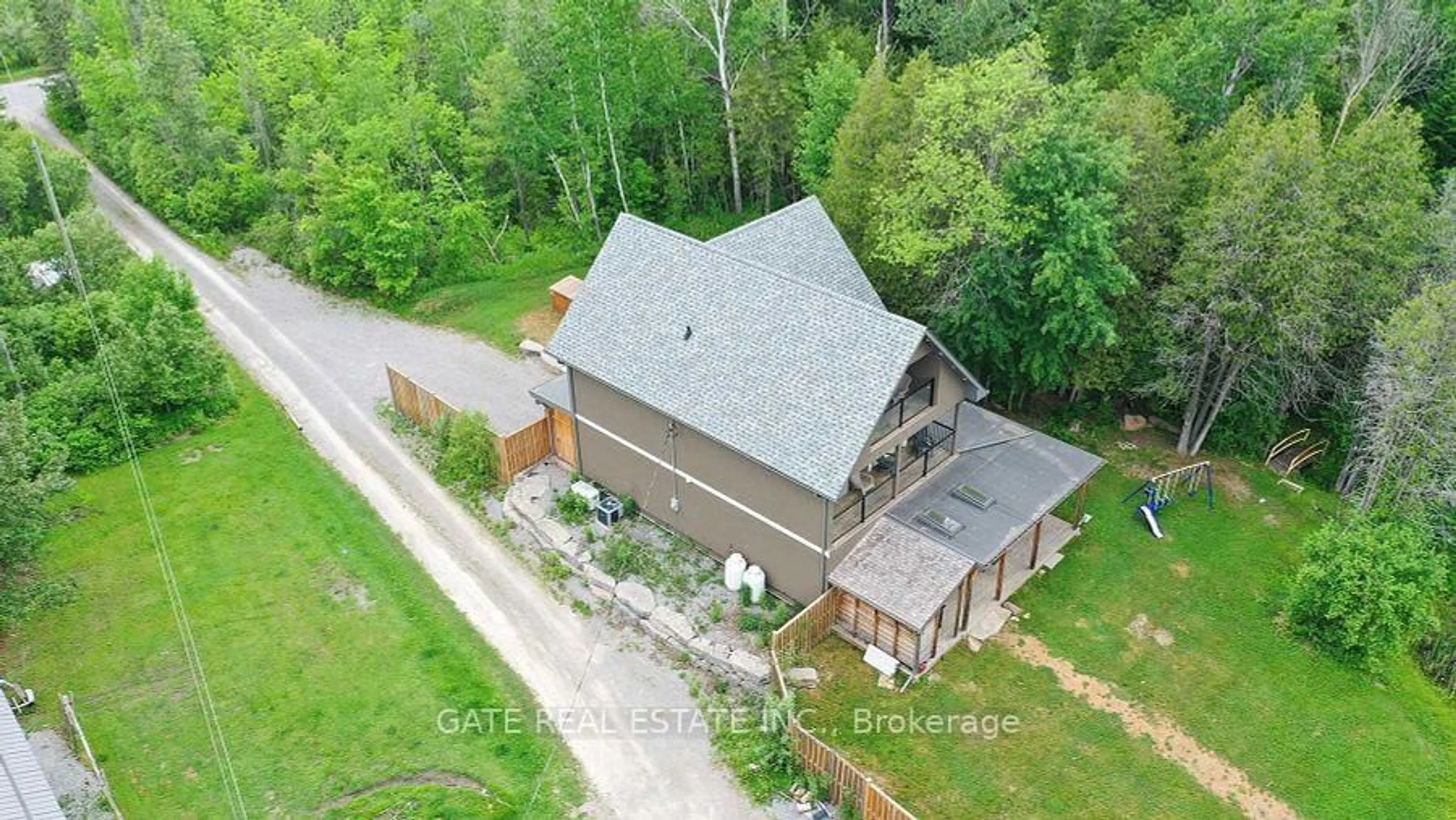 A pic from outside/outdoor area/front of a property/back of a property/a pic from drone, building for 44 Bass Lake Rd, Trent Lakes Ontario K0M 1A0