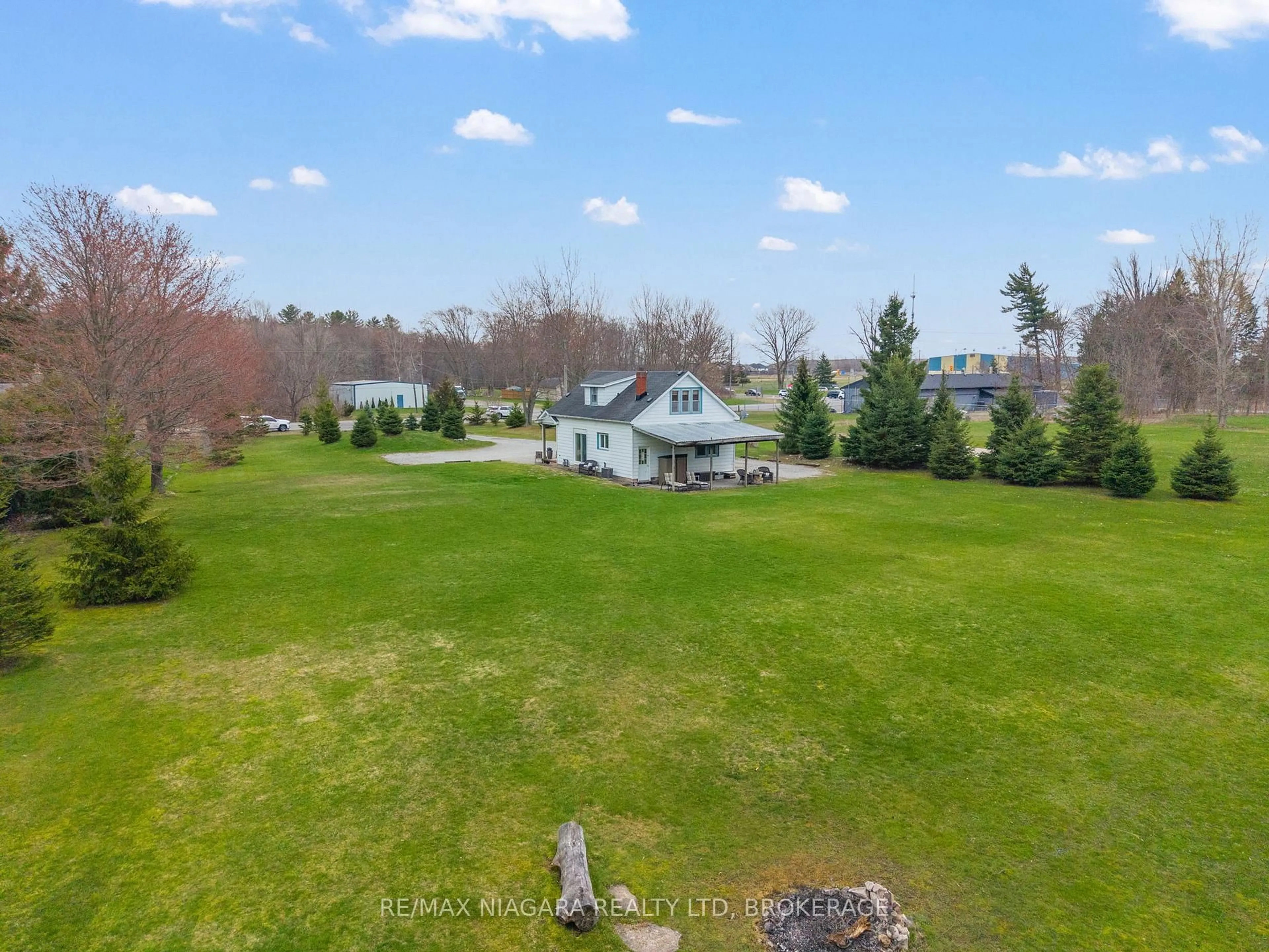 A pic from outside/outdoor area/front of a property/back of a property/a pic from drone, water/lake/river/ocean view for 1183 Merrittville Highway, Thorold Ontario L3B 5N5