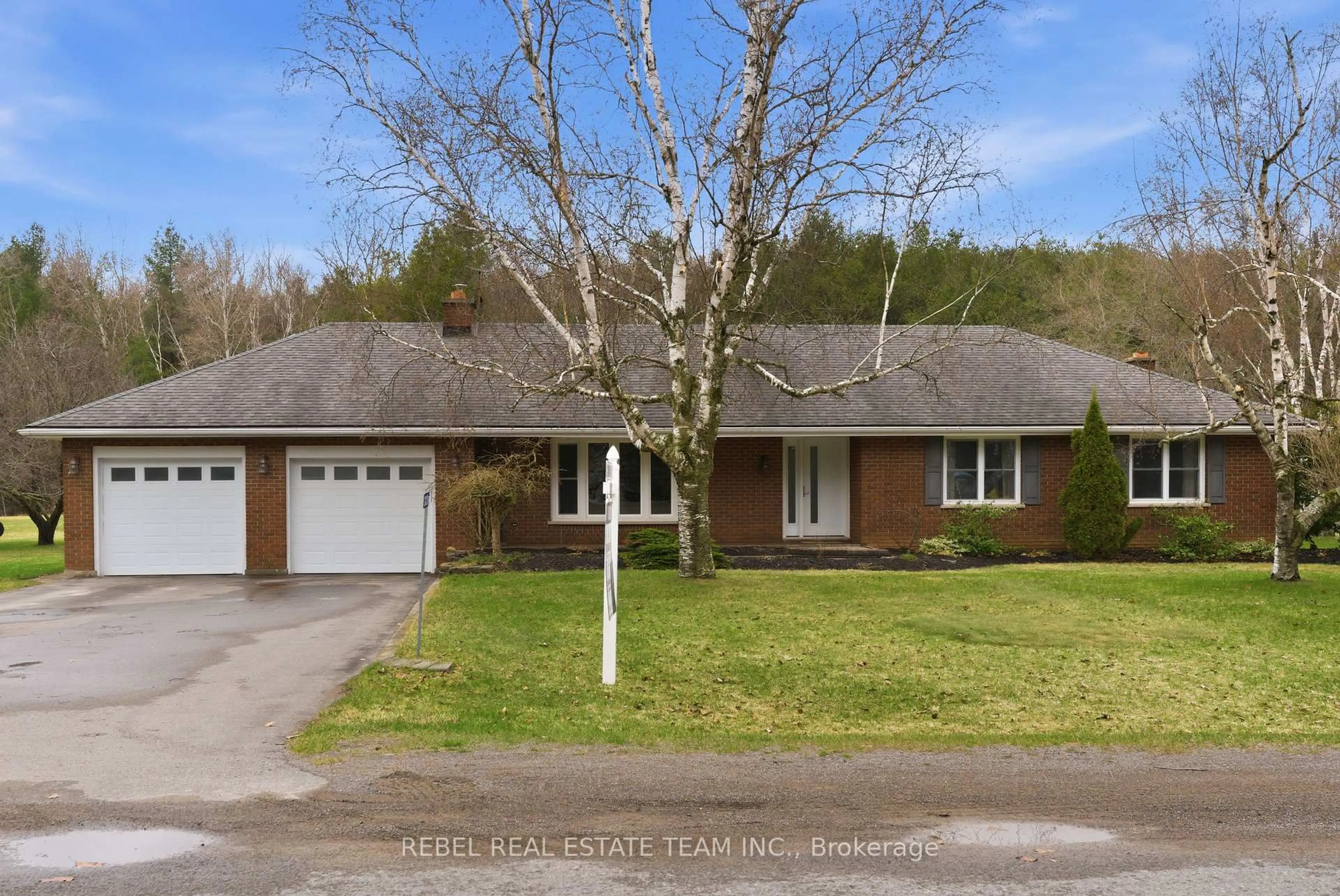 Home with brick exterior material, street for 323 FLYING CLUB Rd, Stirling Ontario K0K 3E0