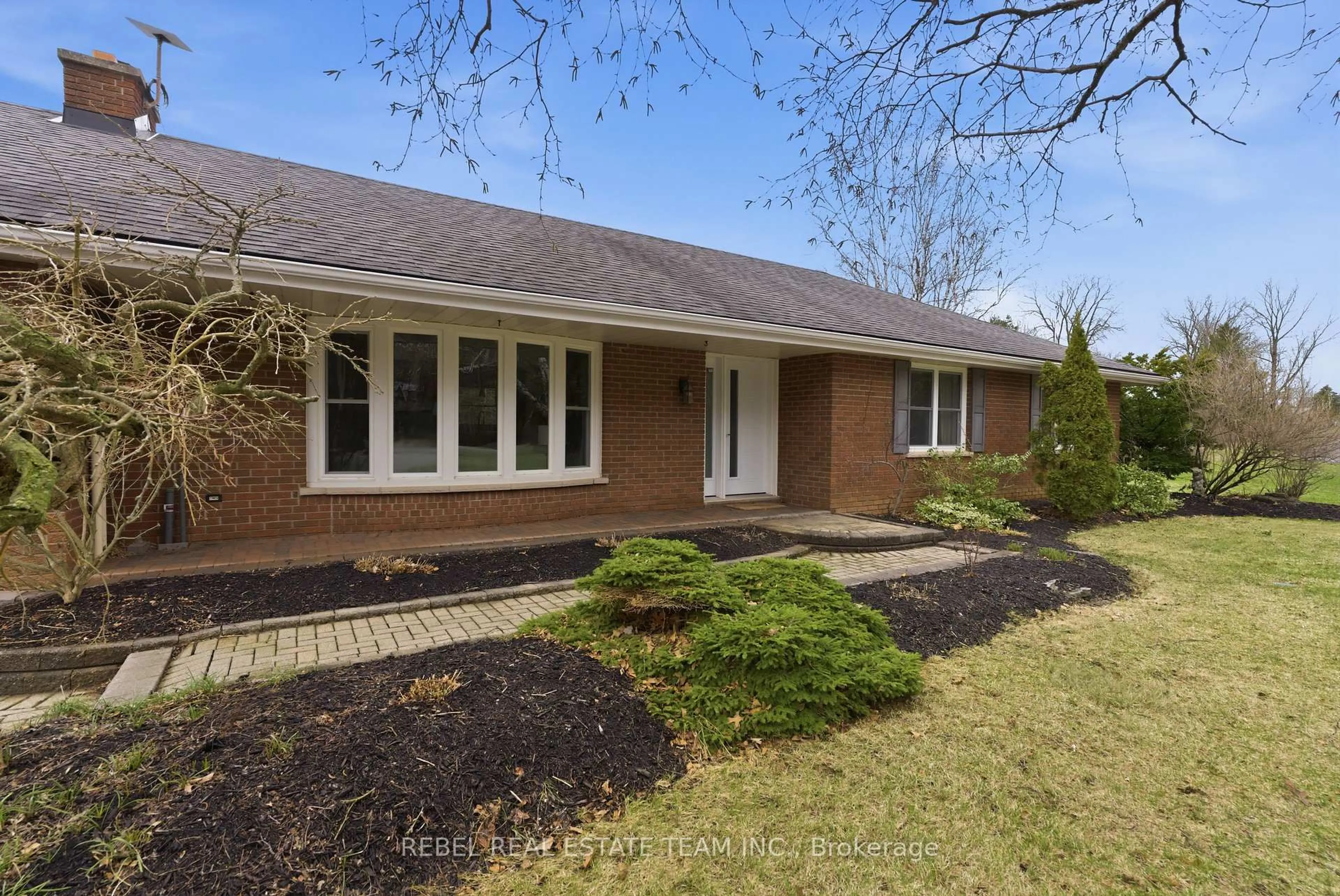 Home with brick exterior material, street for 323 FLYING CLUB Rd, Stirling Ontario K0K 3E0