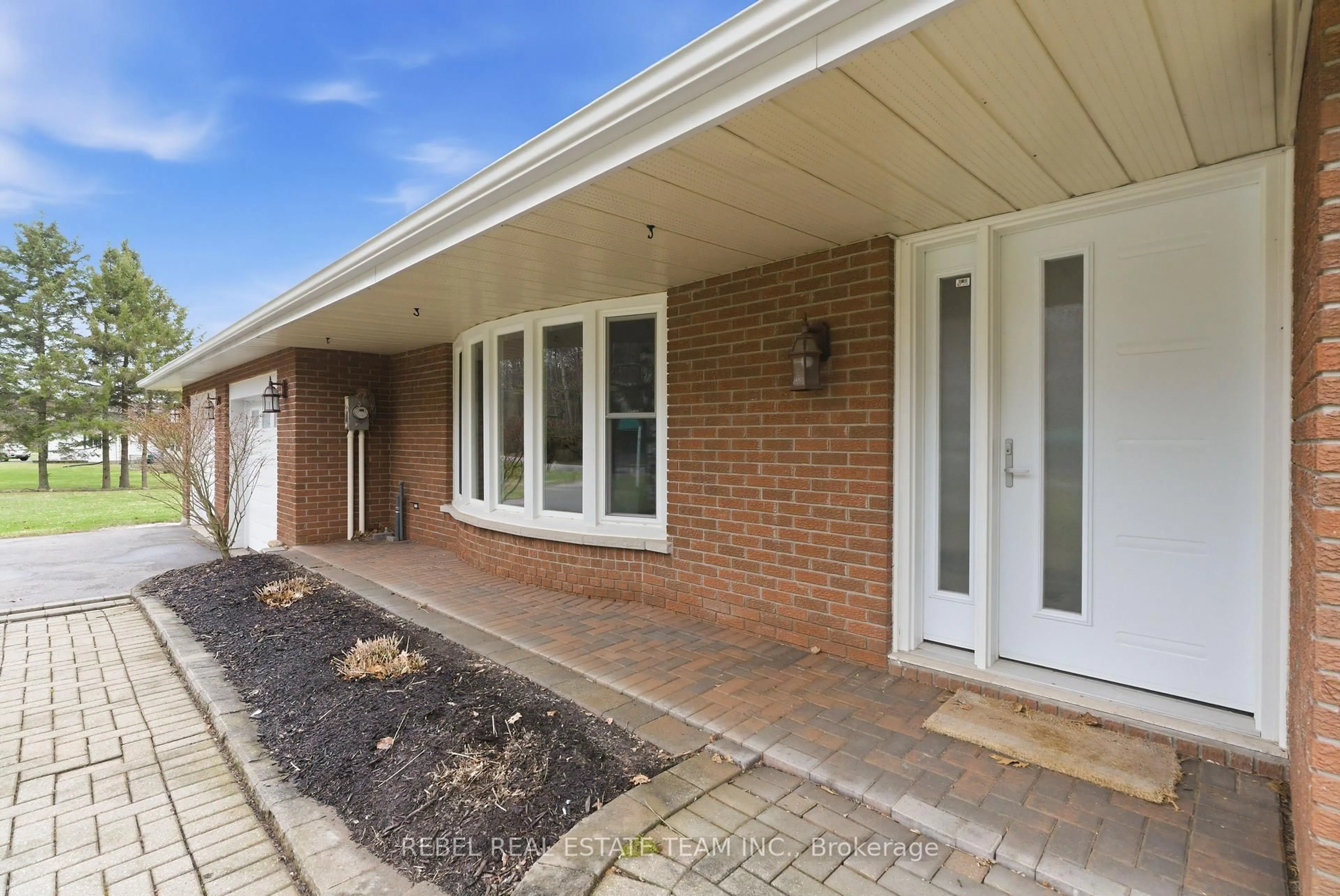 Home with brick exterior material, street for 323 FLYING CLUB Rd, Stirling Ontario K0K 3E0