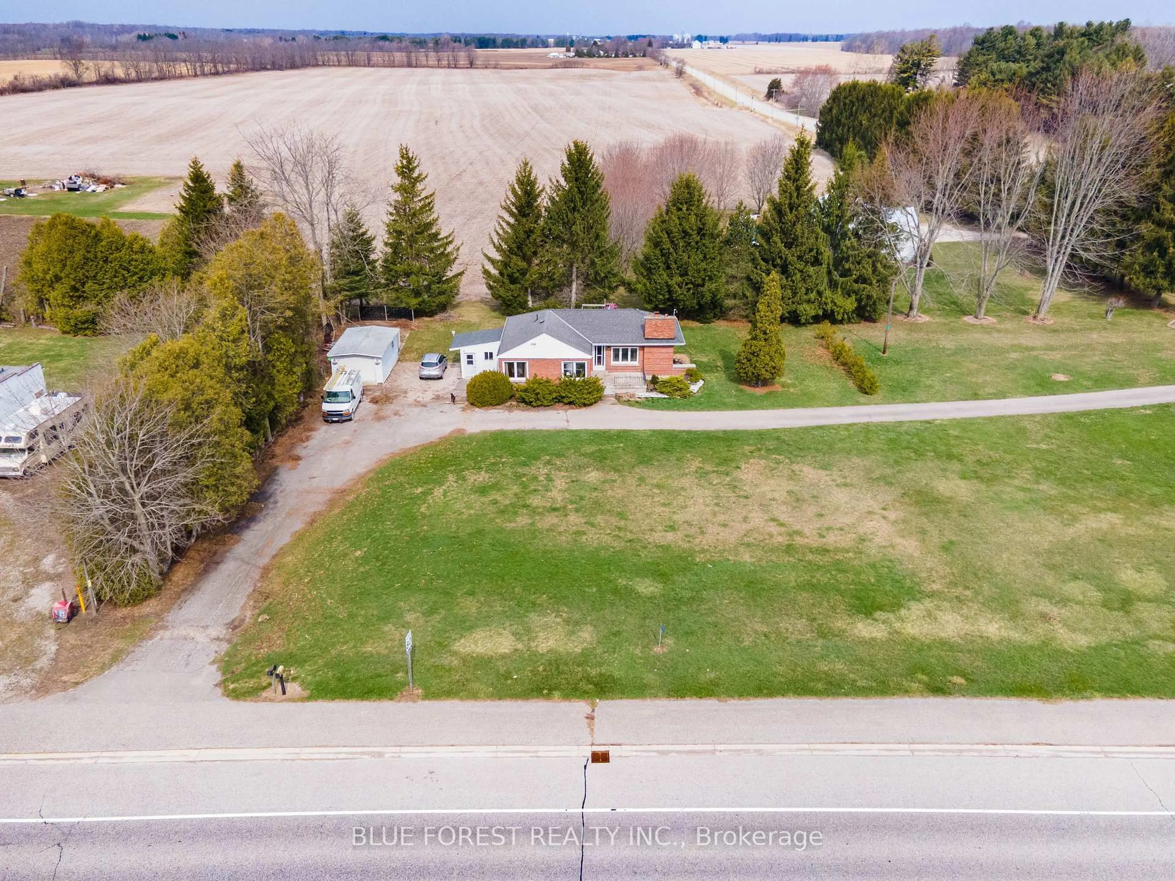 A pic from outside/outdoor area/front of a property/back of a property/a pic from drone, unknown for 22300 Talbot Line, West Elgin Ontario N0L 2C0