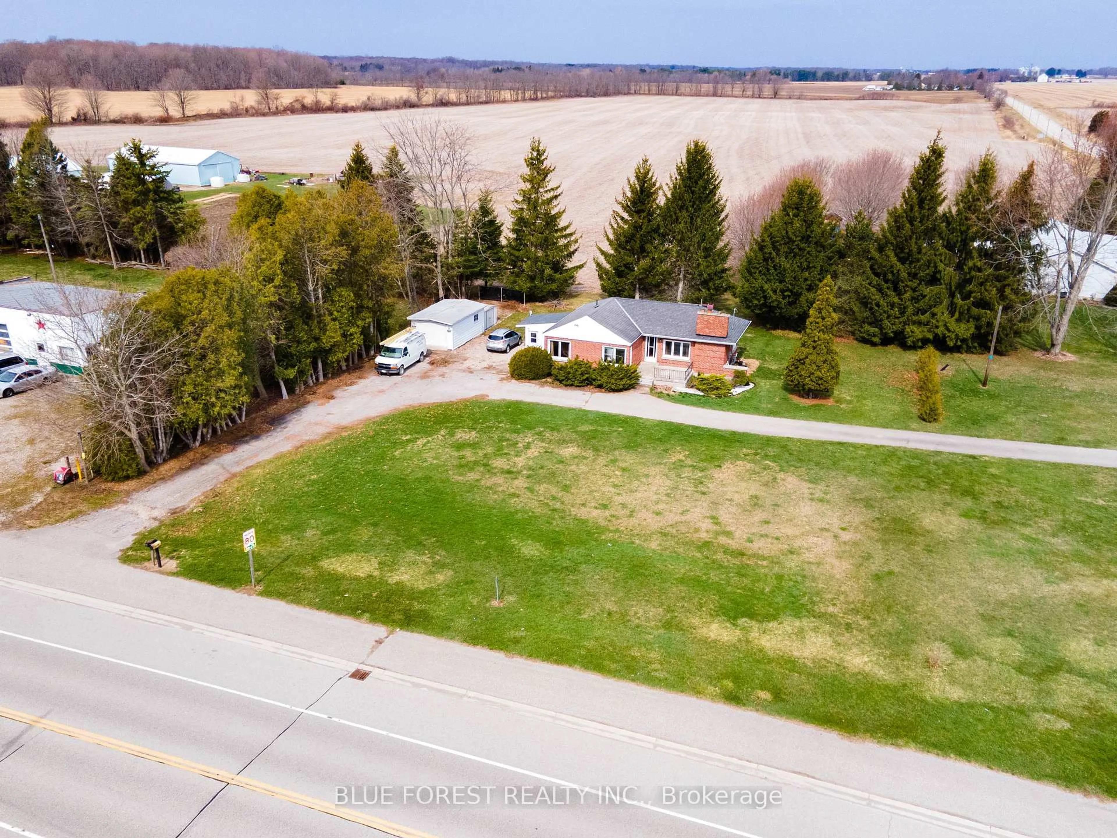 A pic from outside/outdoor area/front of a property/back of a property/a pic from drone, unknown for 22300 Talbot Line, West Elgin Ontario N0L 2C0