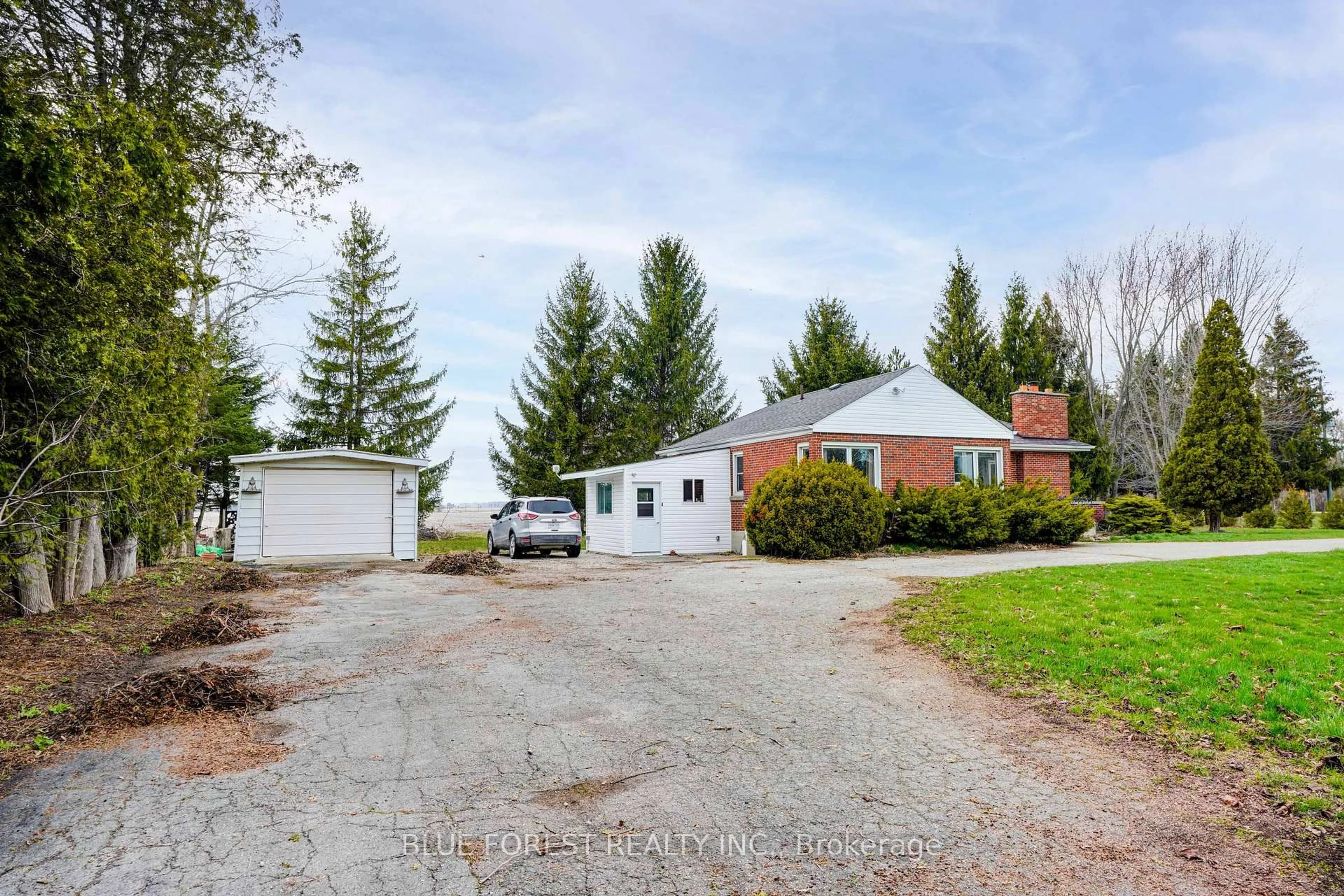 A pic from outside/outdoor area/front of a property/back of a property/a pic from drone, street for 22300 Talbot Line, West Elgin Ontario N0L 2C0