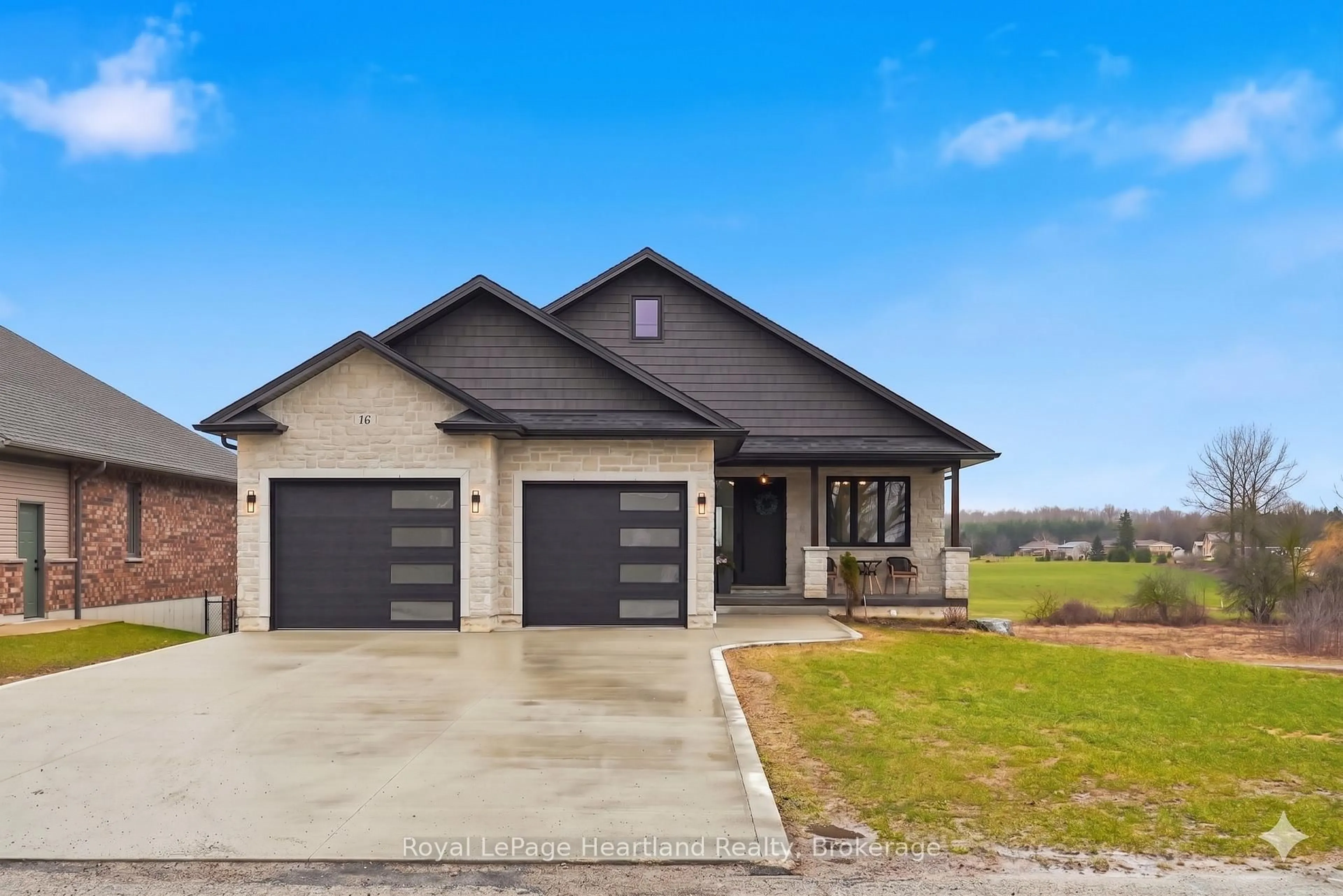 Home with brick exterior material, street for 16 Minto St, Minto Ontario N0G 1M0