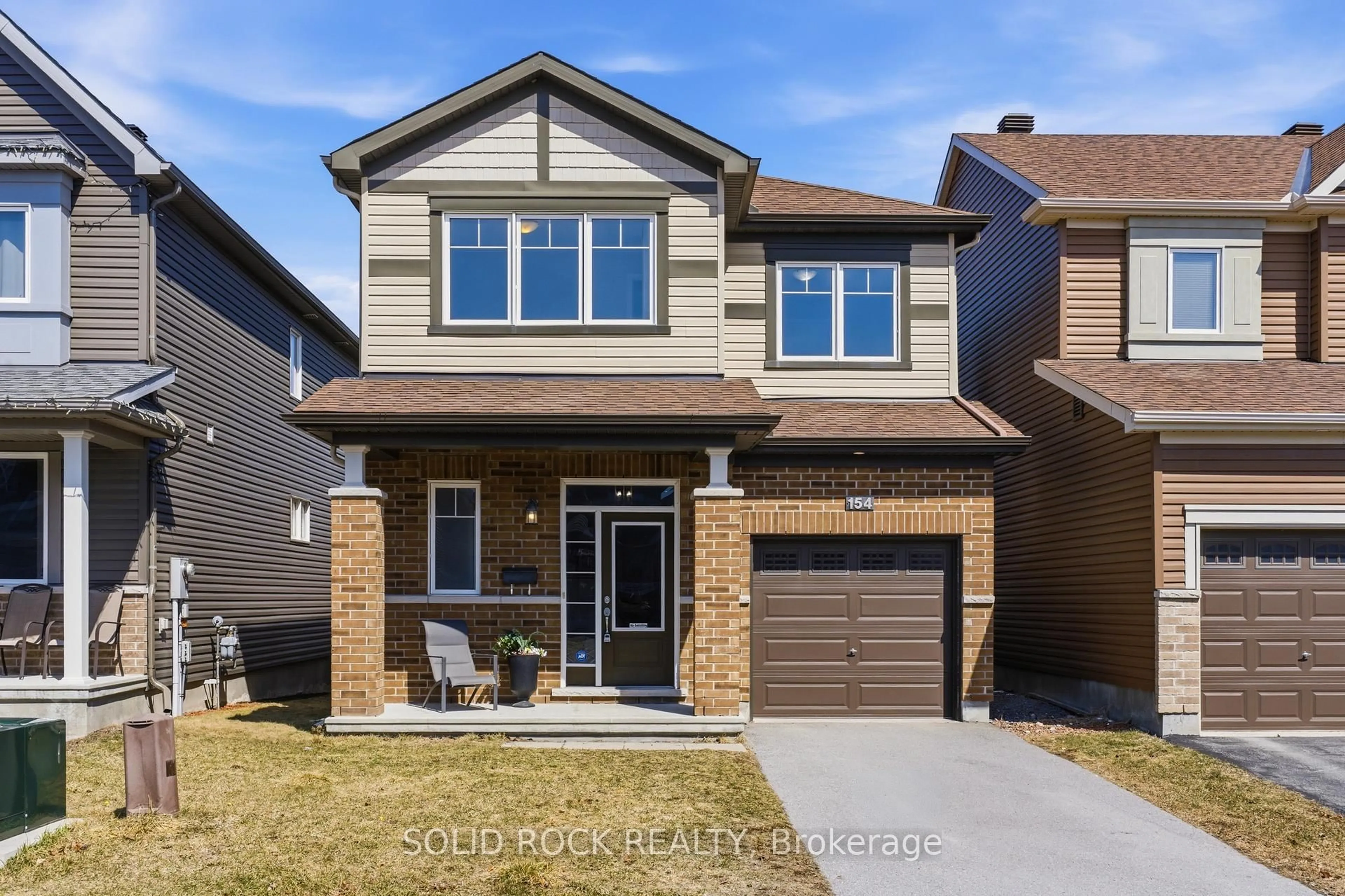 Home with brick exterior material, street for 154 Westover Cres, Kanata Ontario K2T 0K6