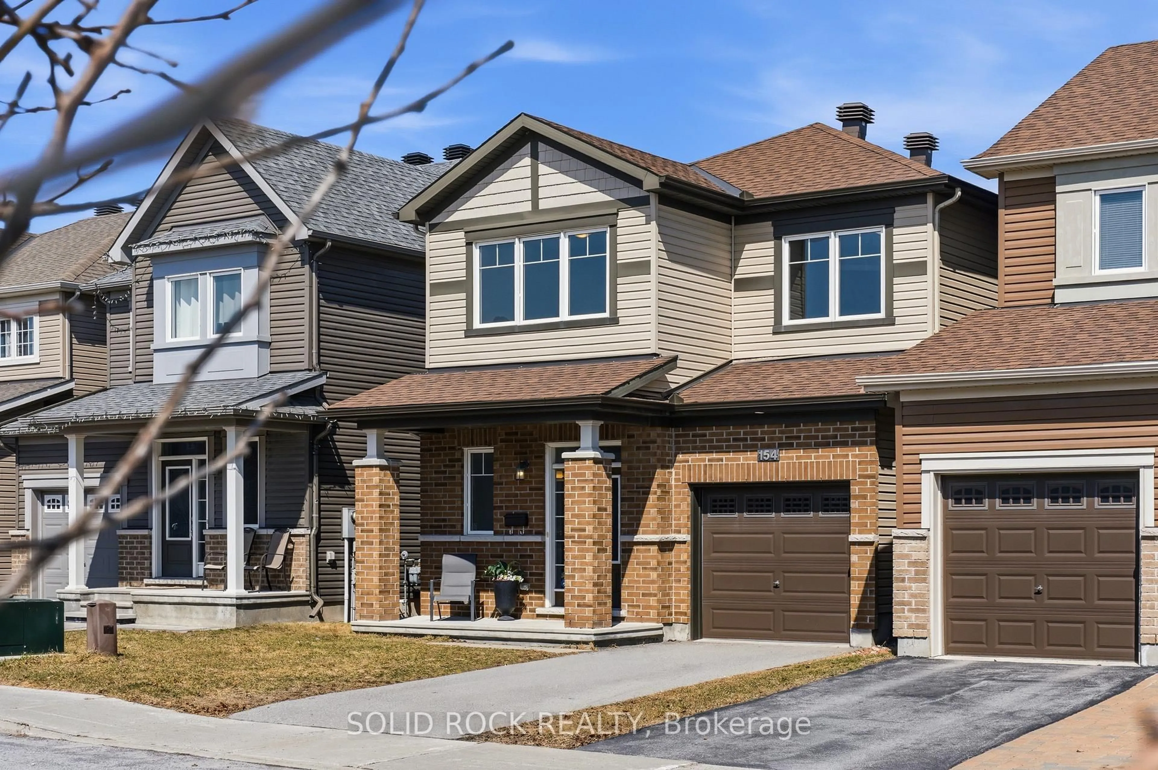 Home with brick exterior material, street for 154 Westover Cres, Kanata Ontario K2T 0K6