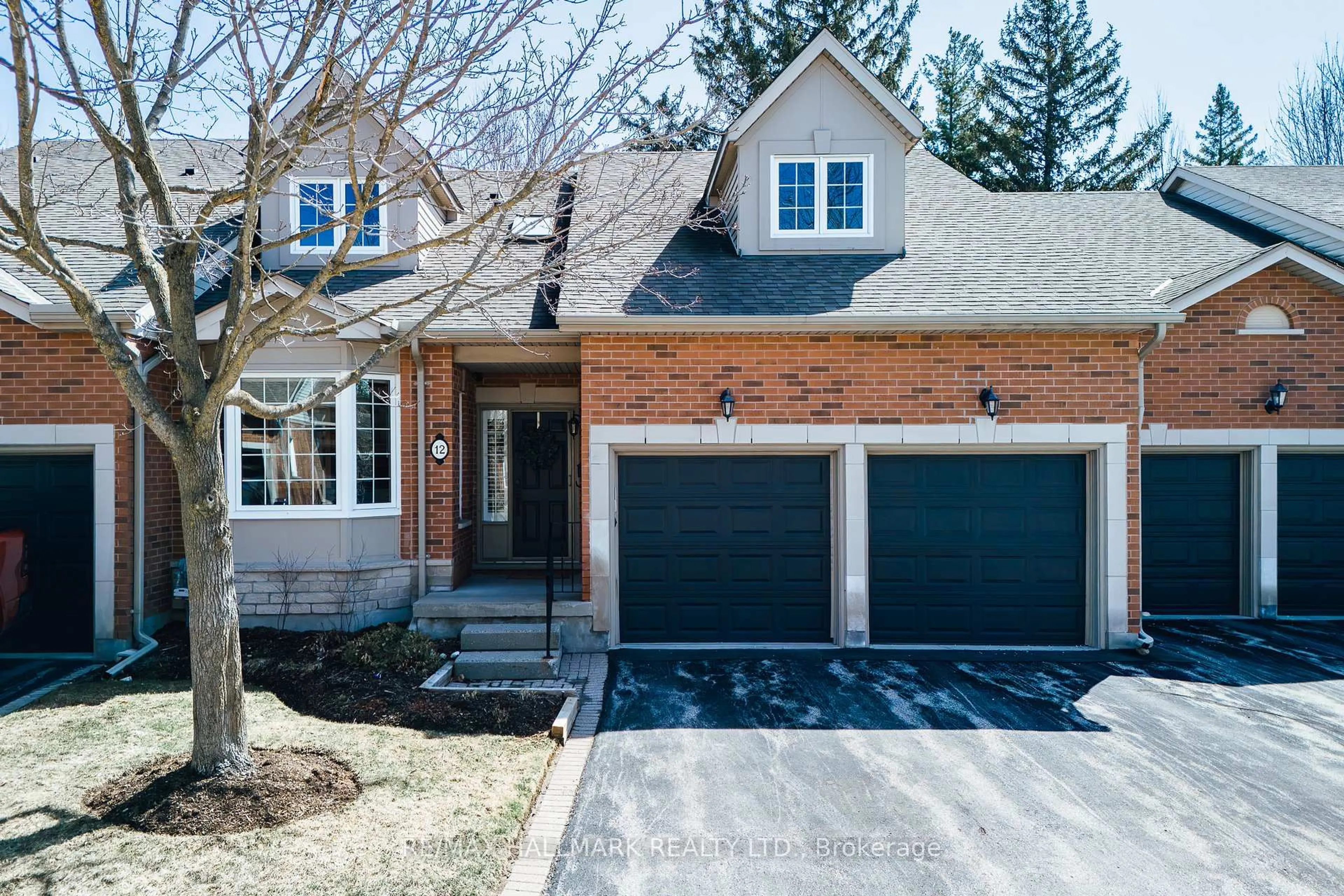 Home with brick exterior material, street for 12 Fairway Lane, Guelph Ontario N1E 7A9
