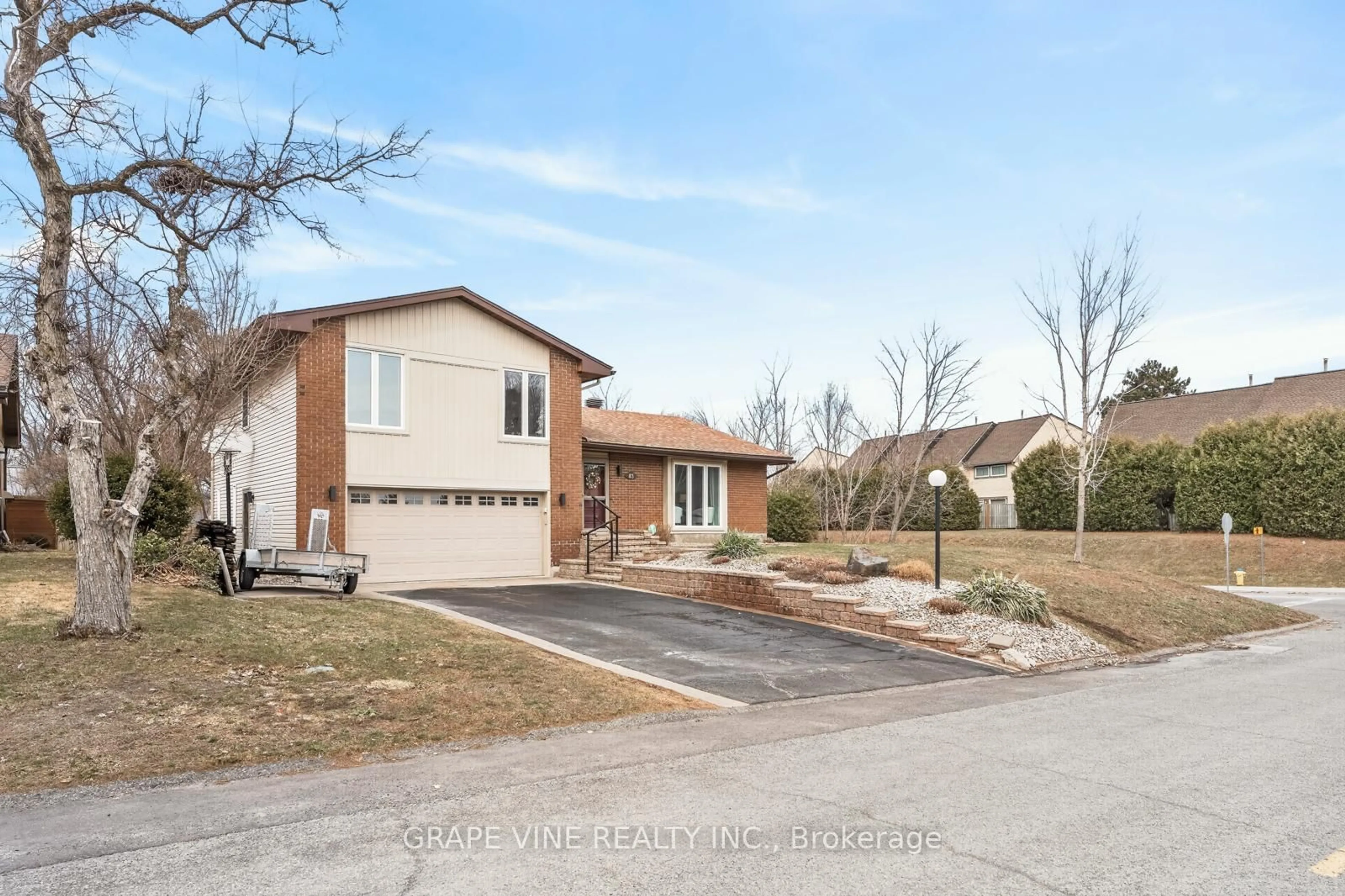 Home with brick exterior material, street for 83 Nanook Cres, Ottawa Ontario K2L 2B2