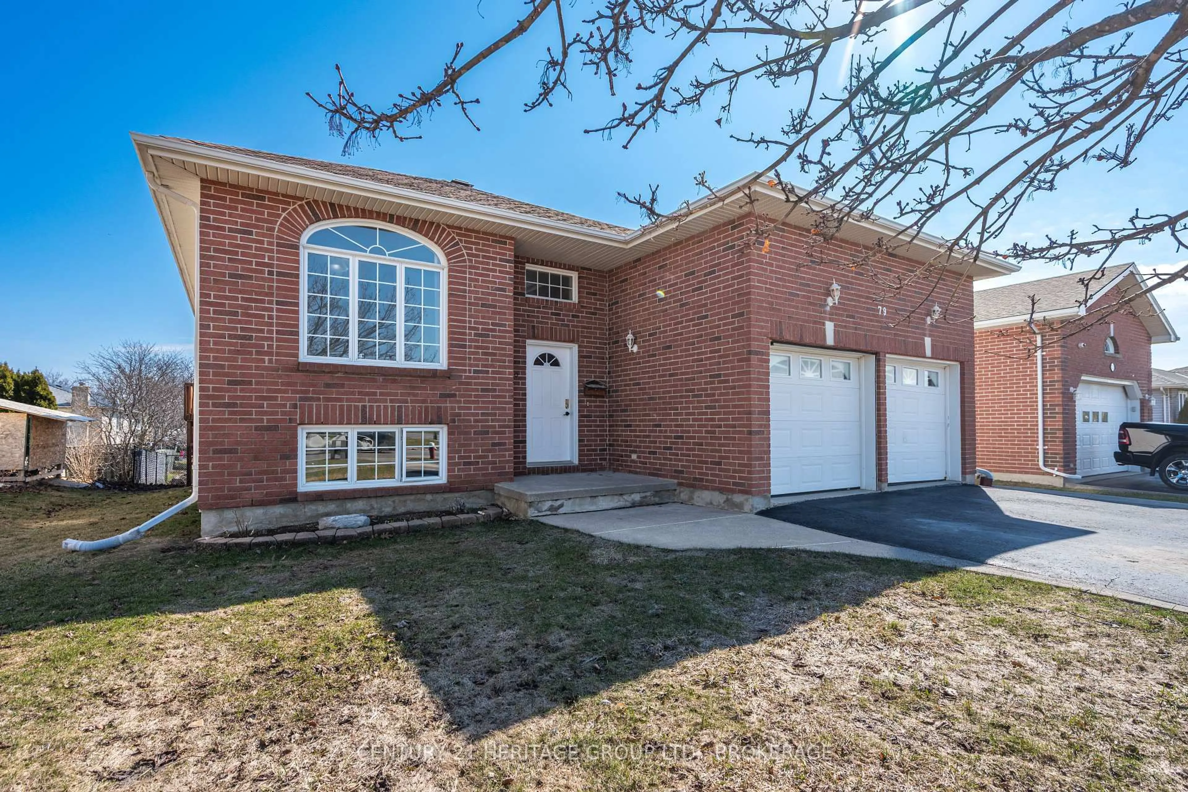 Home with brick exterior material, street for 79 SPEERS Blvd, Loyalist Ontario K7N 1Y8