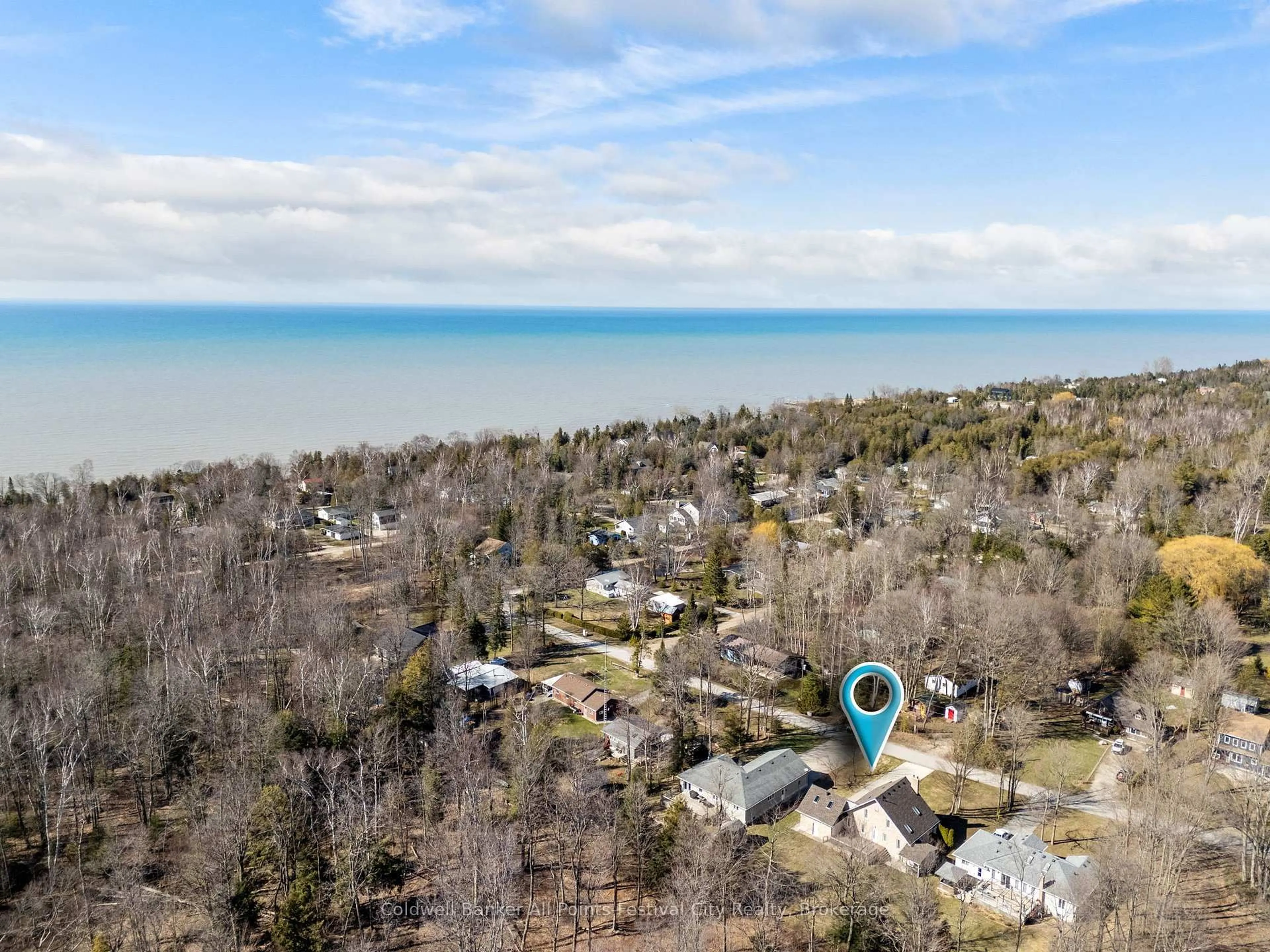 A pic from outside/outdoor area/front of a property/back of a property/a pic from drone, water/lake/river/ocean view for 207 Birch Cres, Huron-Kinloss Ontario N0G 2R0