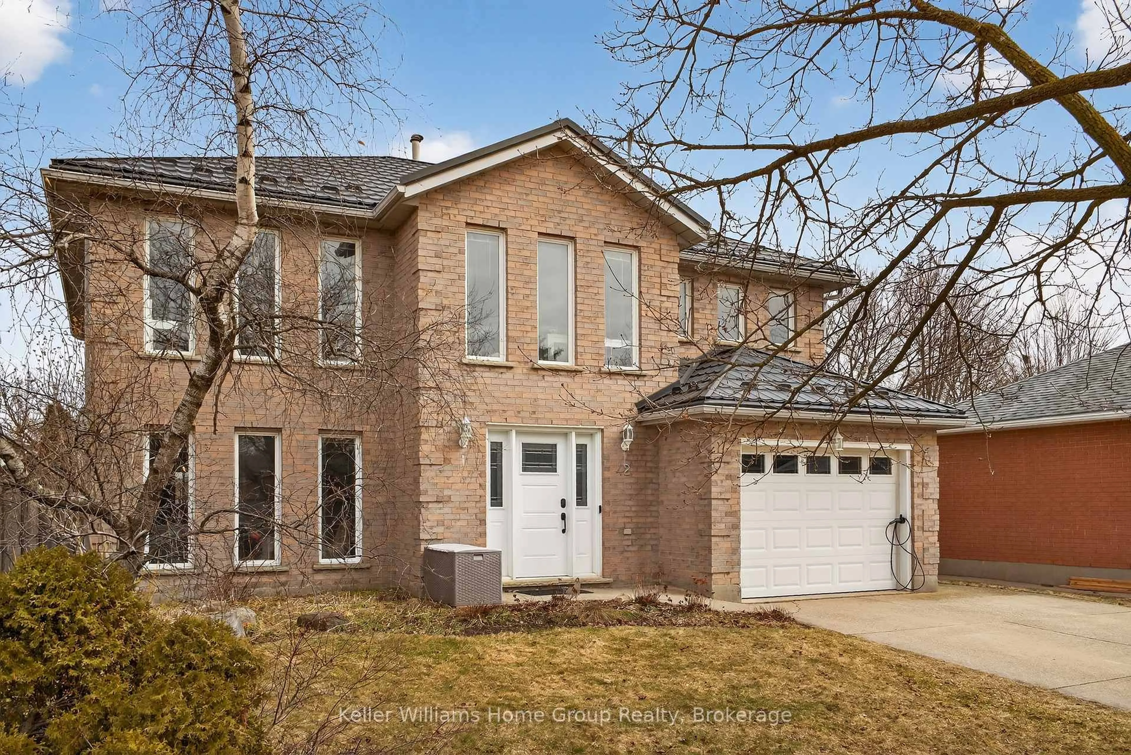 Home with brick exterior material, street for 42 Freshmeadow Way, Guelph Ontario N1K 1R9