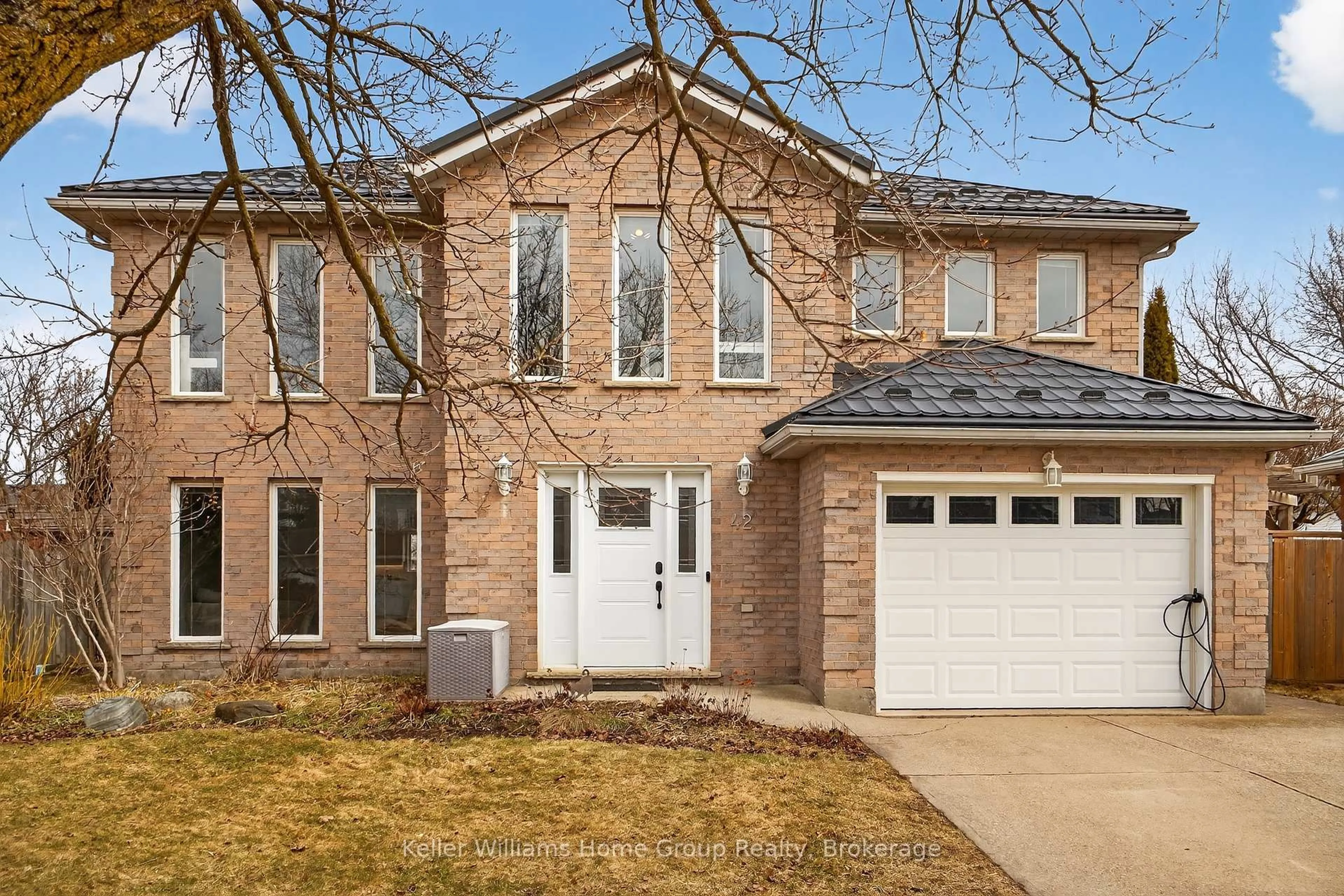 Home with brick exterior material, street for 42 Freshmeadow Way, Guelph Ontario N1K 1R9