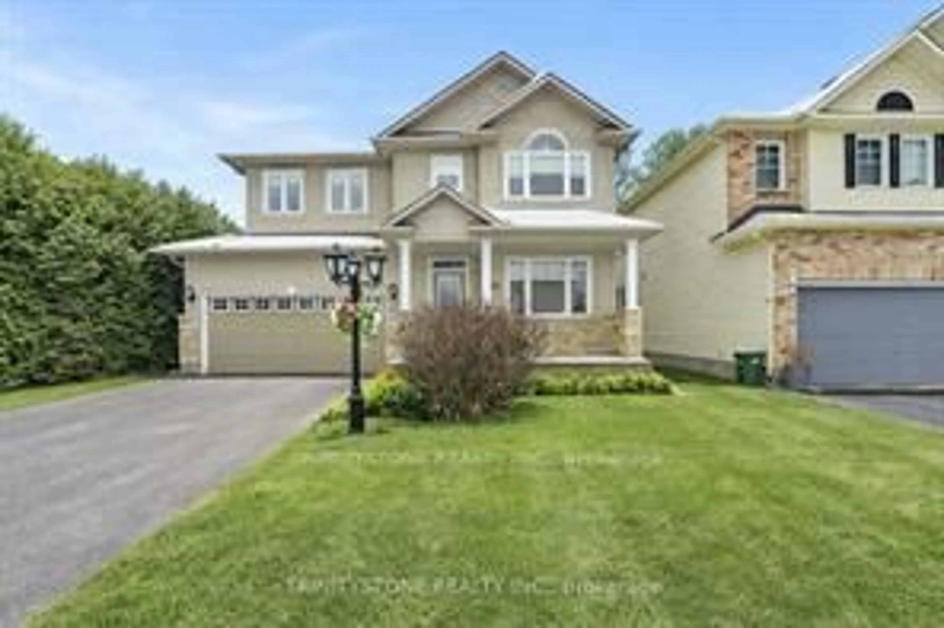 Home with vinyl exterior material, street for 145 Arrowwood Dr, Stittsville Ontario K2S 2G3