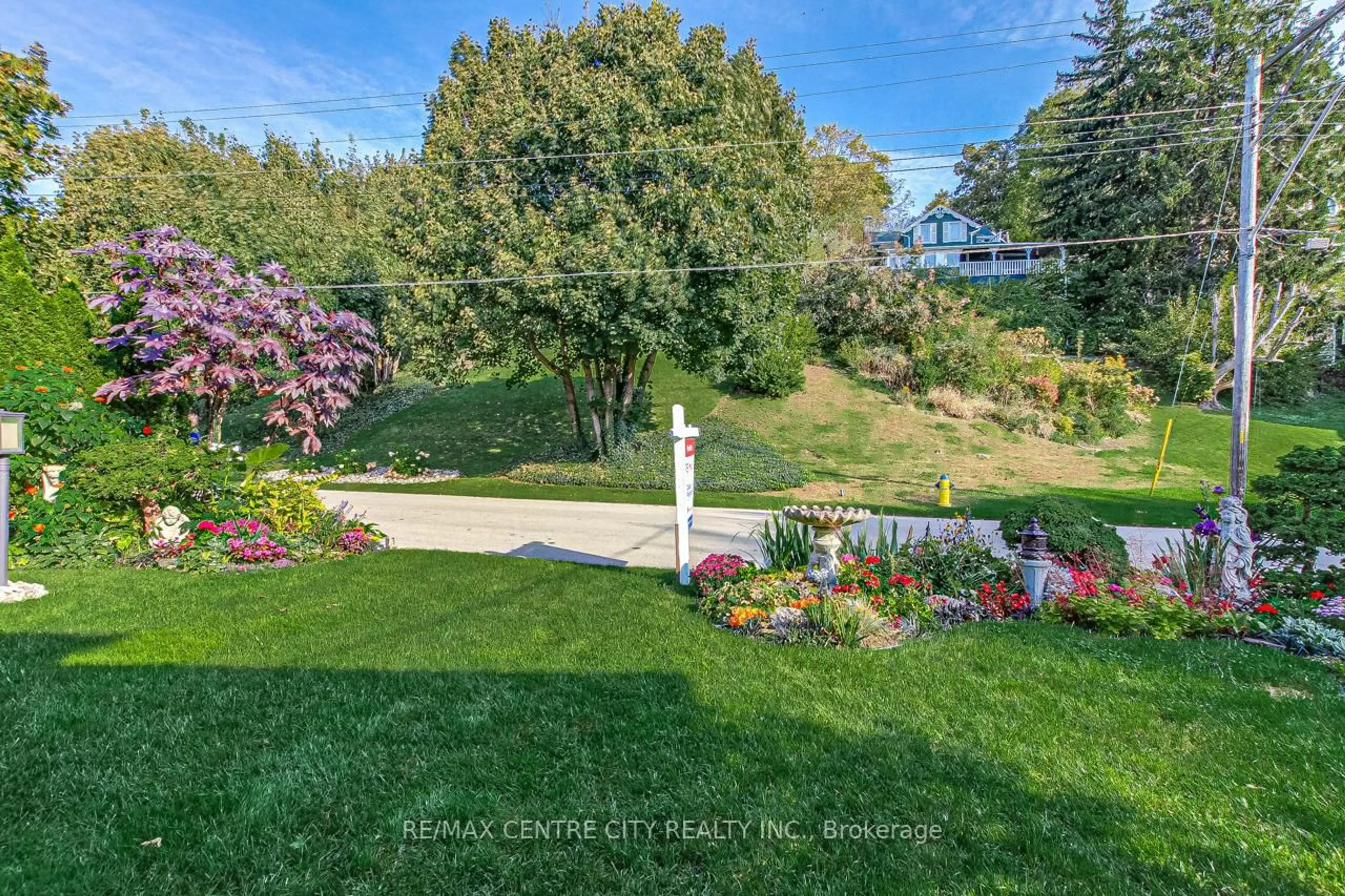 A pic from outside/outdoor area/front of a property/back of a property/a pic from drone, water/lake/river/ocean view for 174 Harrison Pl, Central Elgin Ontario N5L 1A1