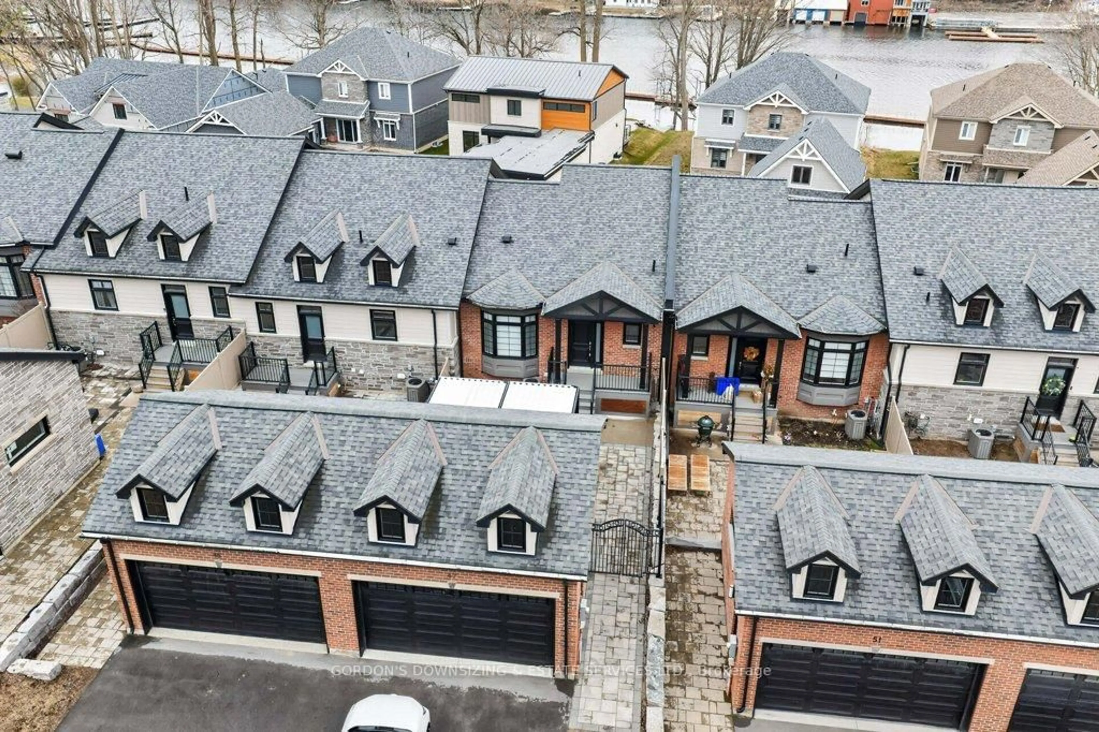 A pic from outside/outdoor area/front of a property/back of a property/a pic from drone, street for 47 Bentley Cres, Prince Edward County Ontario K0K 2T0