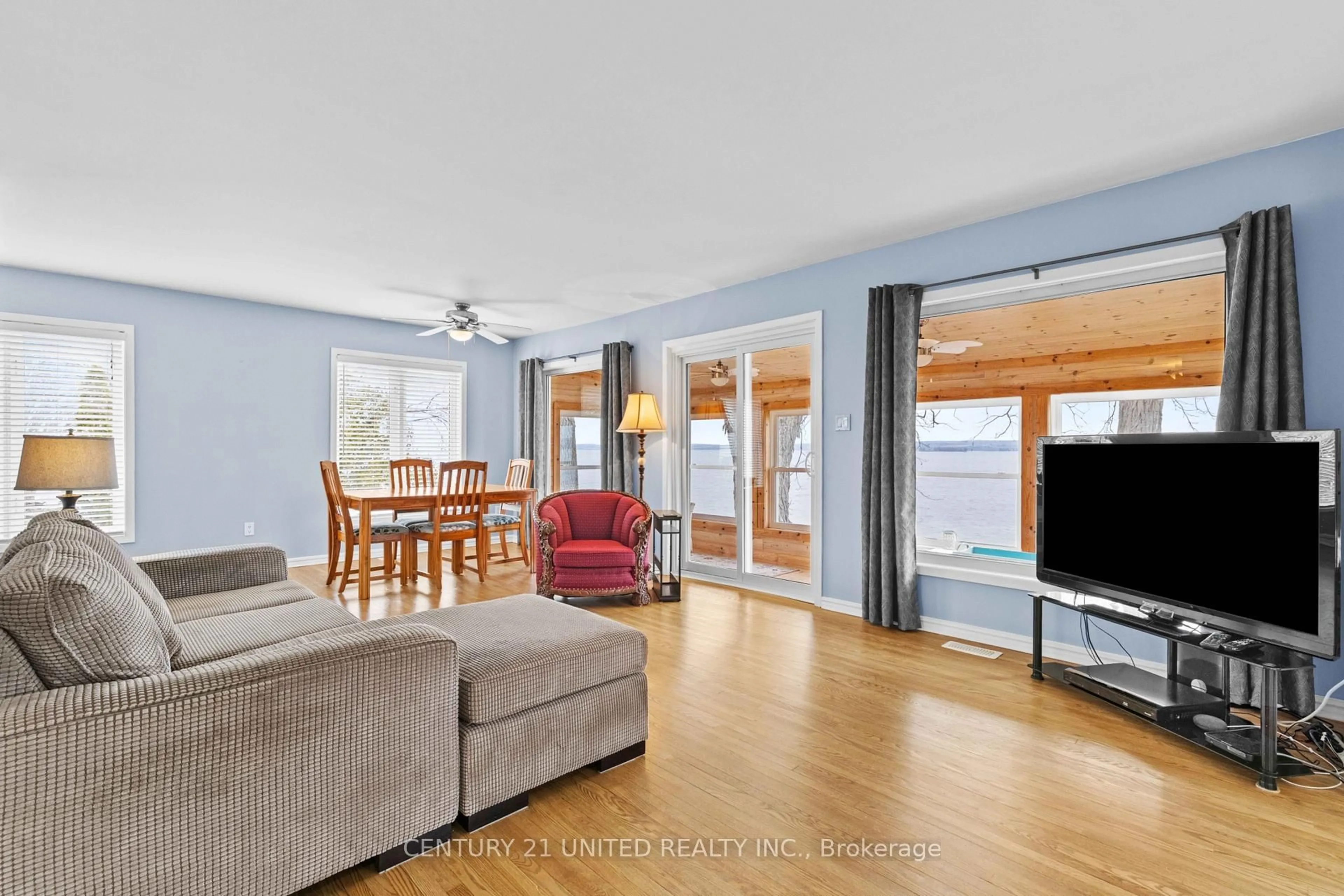 Living room with furniture, wood/laminate floor for 40 Ivey Lane, Otonabee-South Monaghan Ontario K0L 2G0